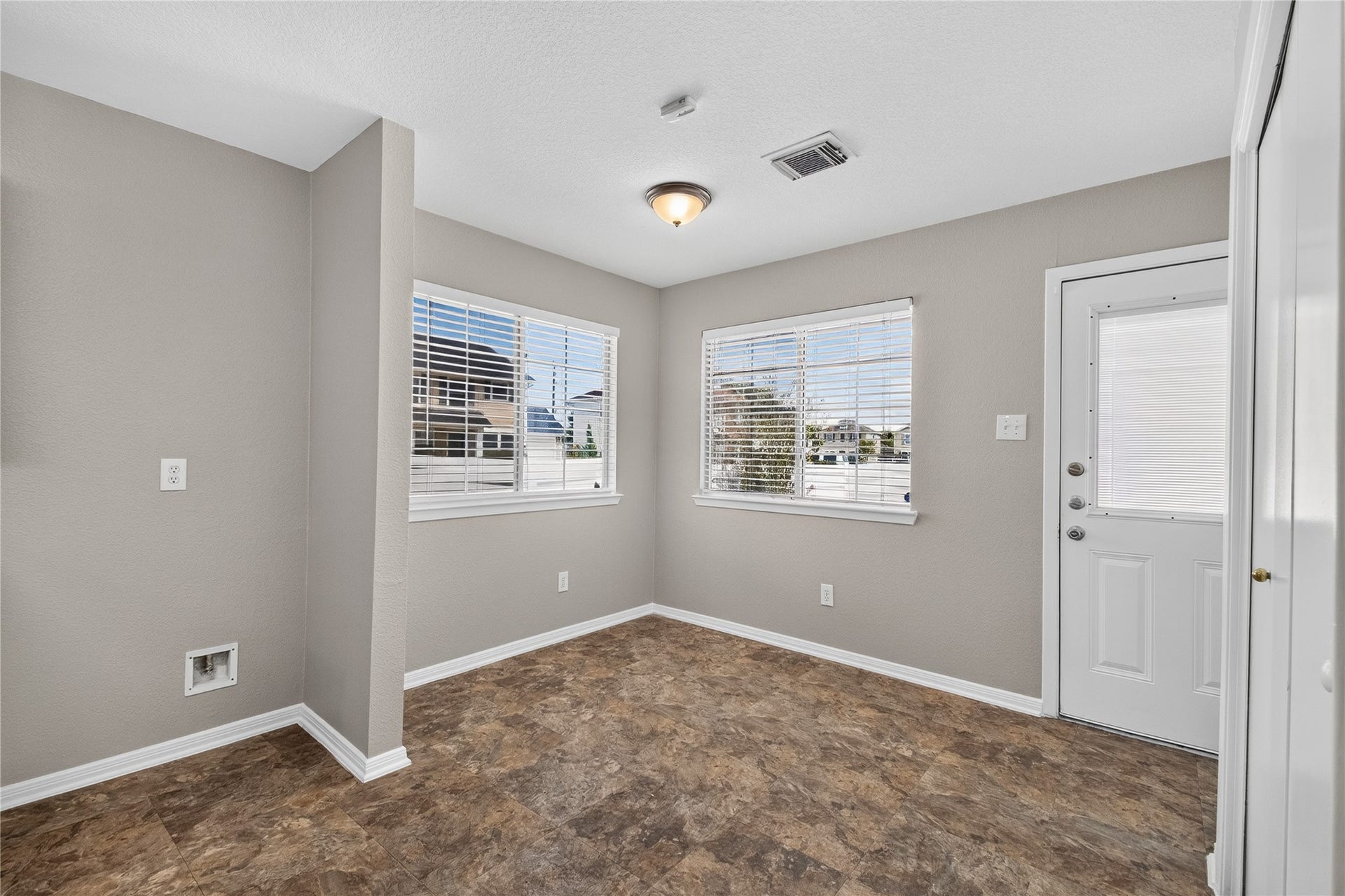 19547 Fletcher Way Drive, Houston, TX 77073 Natural light fills the breakfast area, with two windows and convenient access to the backyard.