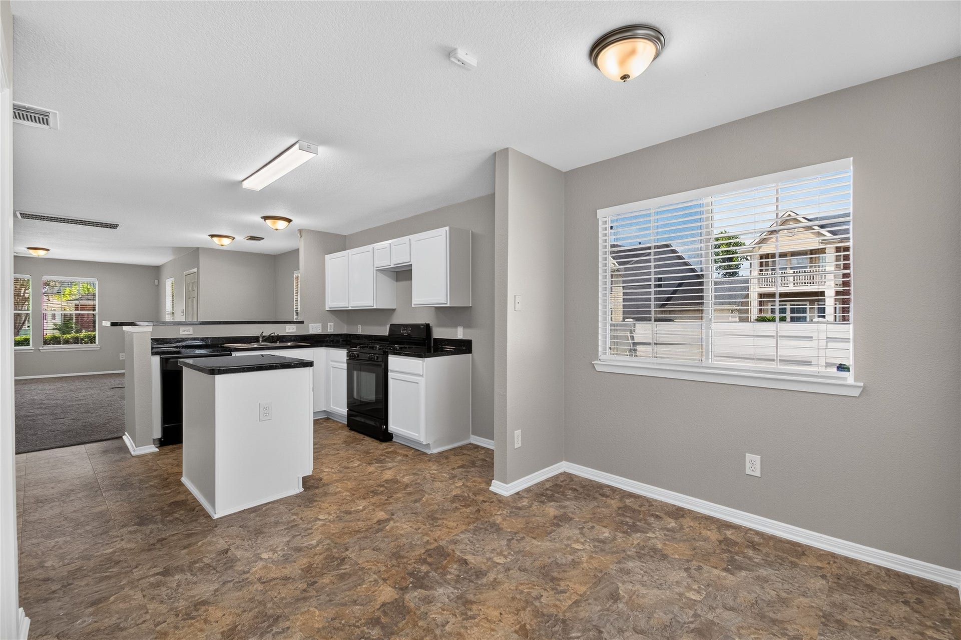 19547 Fletcher Way Drive, Houston, TX 77073 The breakfast area provides a flexible spot for casual dining just steps from the kitchen and backyard.