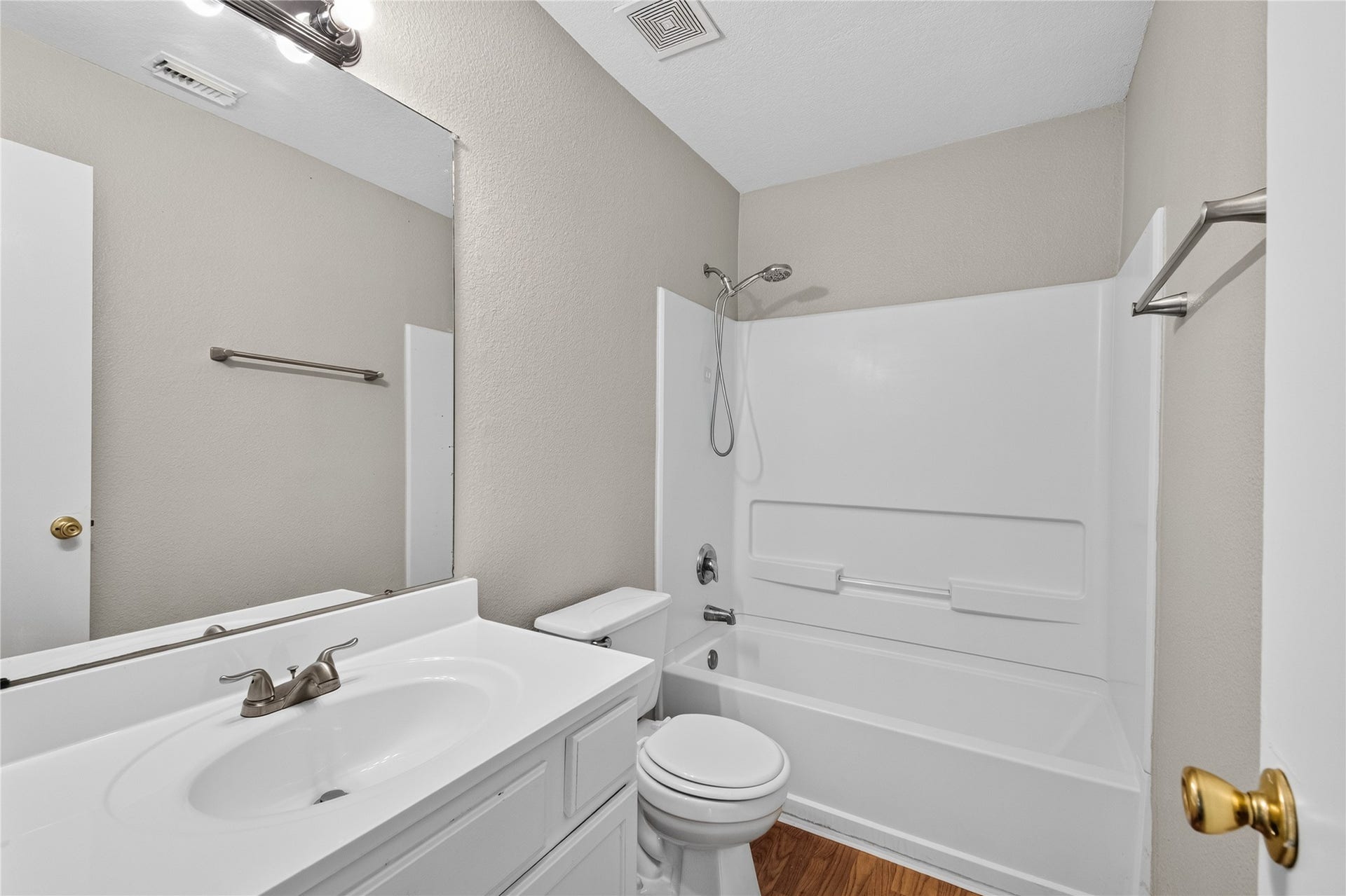 19547 Fletcher Way Drive, Houston, TX 77073 The private primary bath includes a tub/shower combination, single vanity, and neutral finishes.