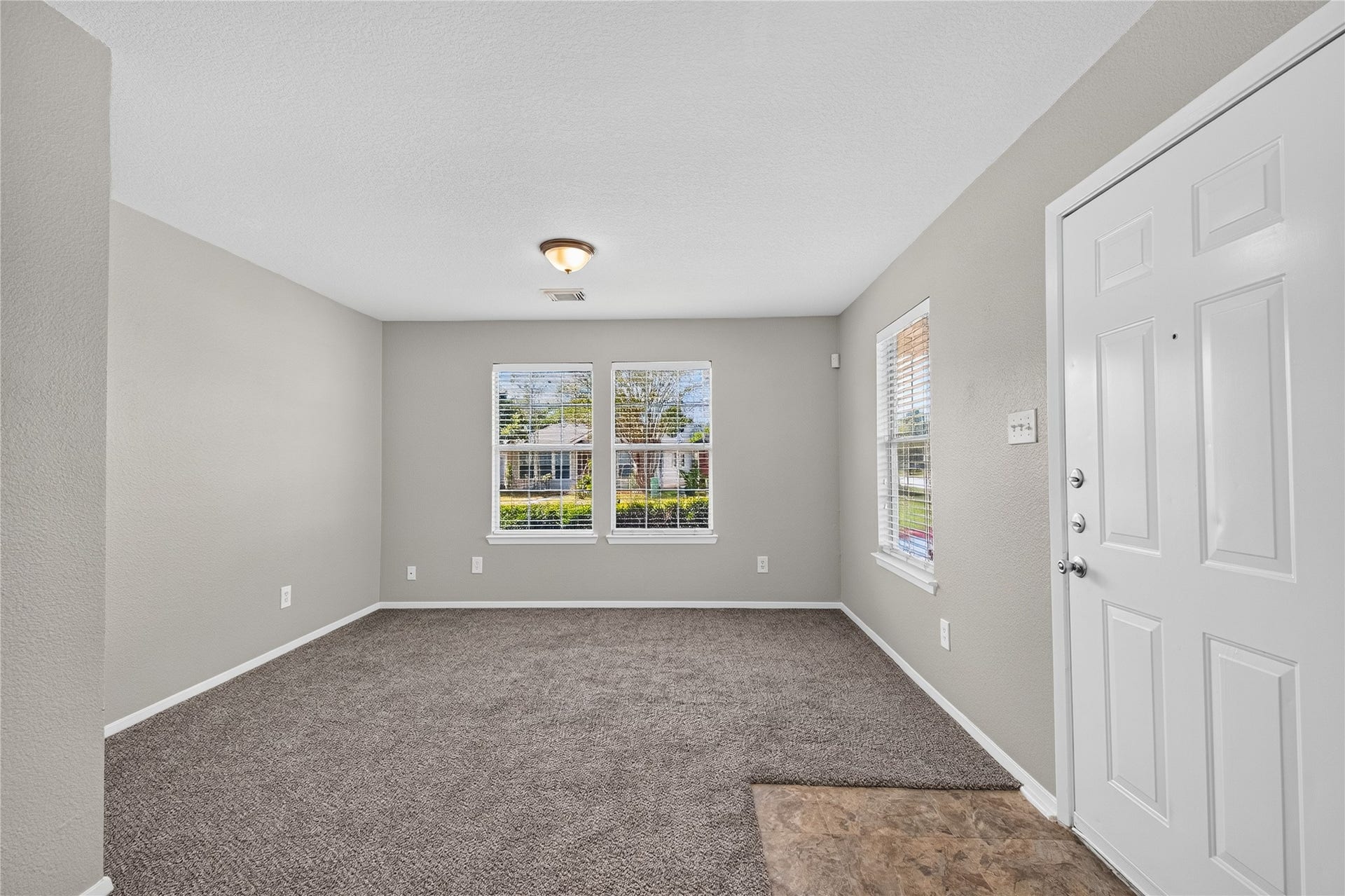 19547 Fletcher Way Drive, Houston, TX 77073 The family room offers comfortable everyday living space with fresh neutral paint and new carpet.