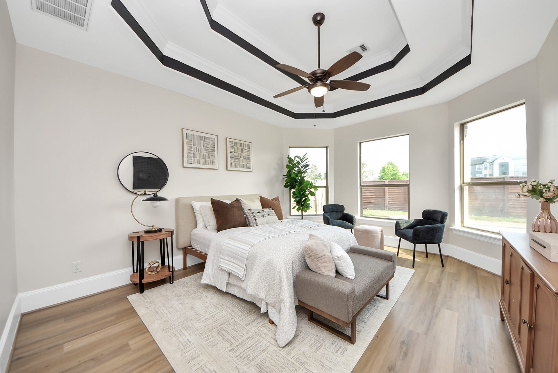 9815 Patricia Haven Lane, Humble, TX 77396 primary bedroom with bay windows