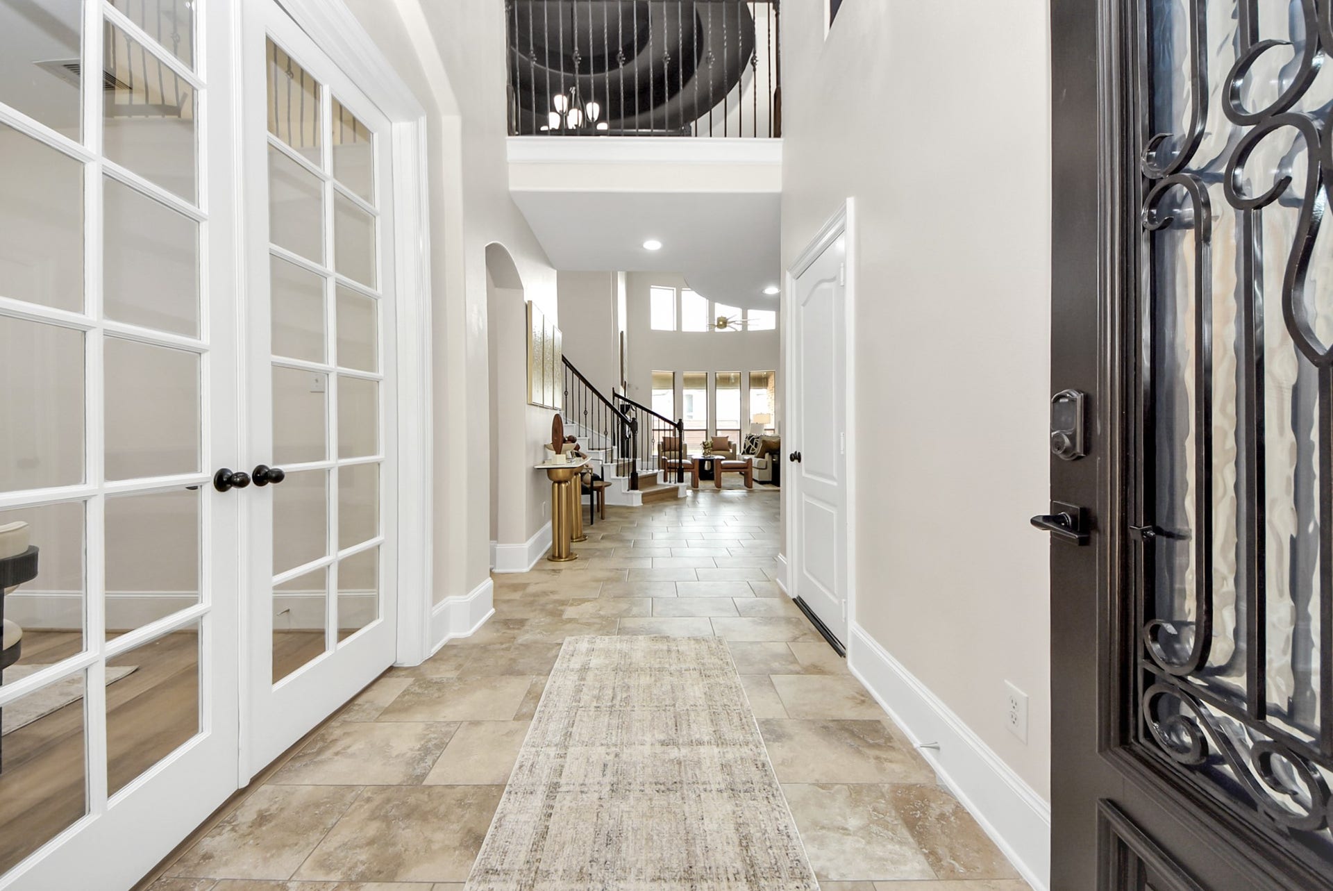 9815 Patricia Haven Lane, Humble, TX 77396 impressive foyer upon entry