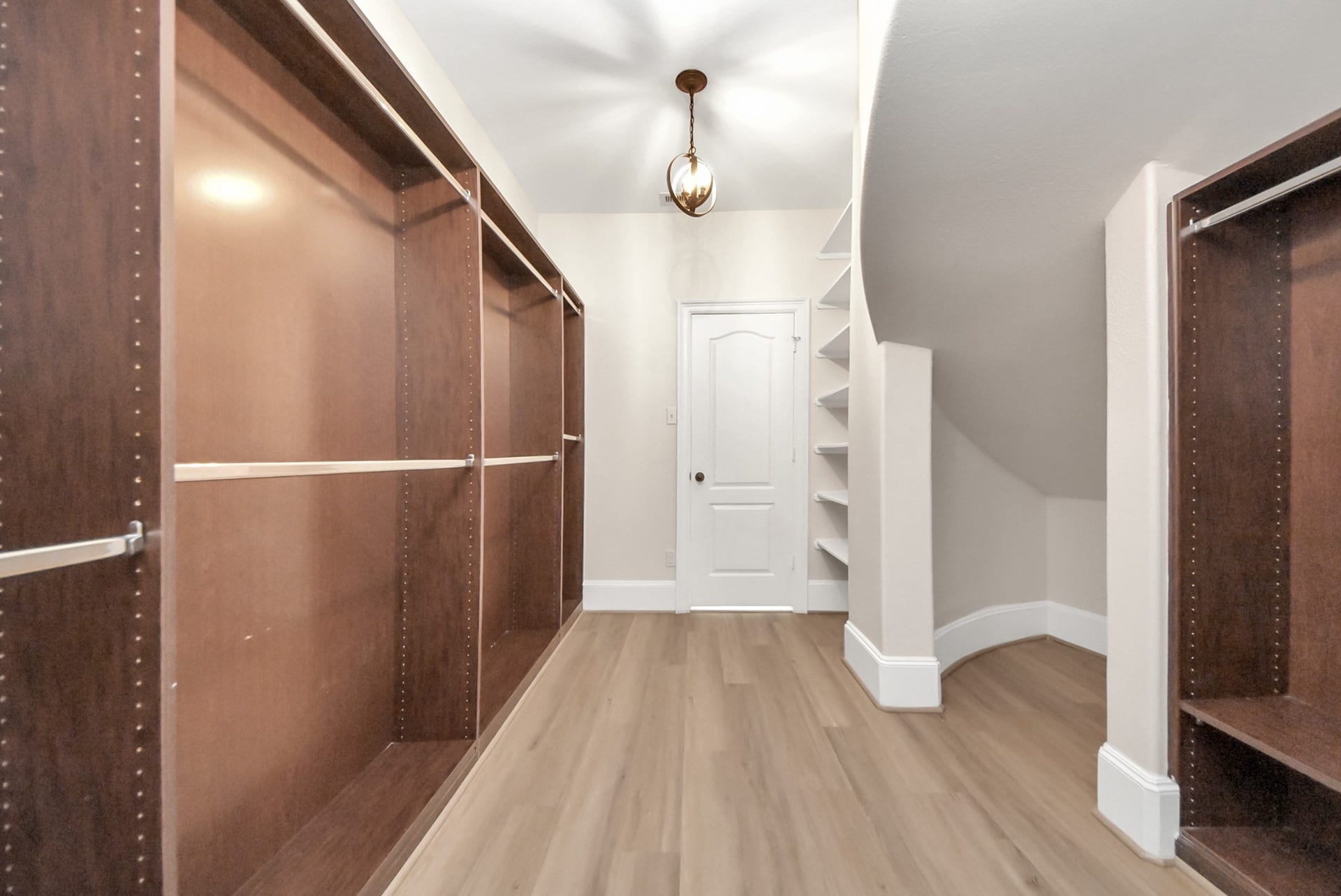 9815 Patricia Haven Lane, Humble, TX 77396 custom built-ins in the primary closet