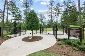 230 Elianne Lace Court, Conroe, TX 77318 Two dog parks so large and small dogs have their
own space to play.