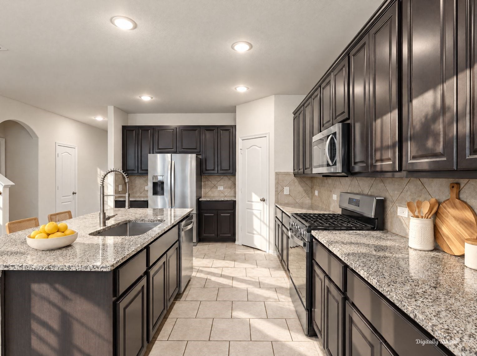 230 Elianne Lace Court, Conroe, TX 77318 Well-appointed kitchen featuring granite counters, an island with an undermount sink, and a pull-down sprayer faucet. A gas range, stainless steel appliances, and tile backsplash complete the look.
This photo has been digitally staged to illustrate the possibilities of the homes aesthetic and potential design. Some furnishings and dcor shown are for visual inspiration.