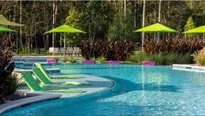 230 Elianne Lace Court, Conroe, TX 77318 A massive, sparkling blue pool serves as the
communitys center for relaxation. Featuring a
beach-entry (zero- entry) design, dedicated lap
lanes, and plenty of room for lounging, it offers a
true vacation-at-home feel.