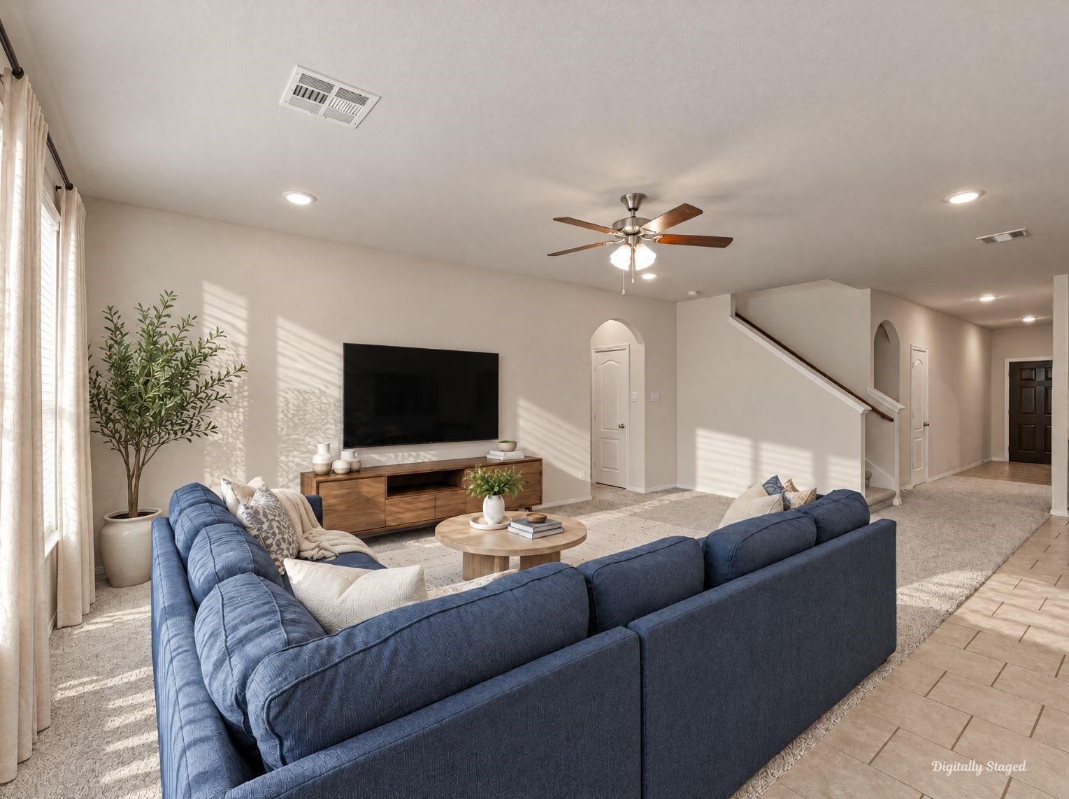 230 Elianne Lace Court, Conroe, TX 77318 Roomy living area with soft carpet and tile flooring that flows toward the entry. Arched alcoves and a staircase with a wood handrail add architectural interest.
This photo has been digitally staged to illustrate the possibilities of the homes aesthetic and potential design. Some furnishings and dcor shown are for visual inspiration.