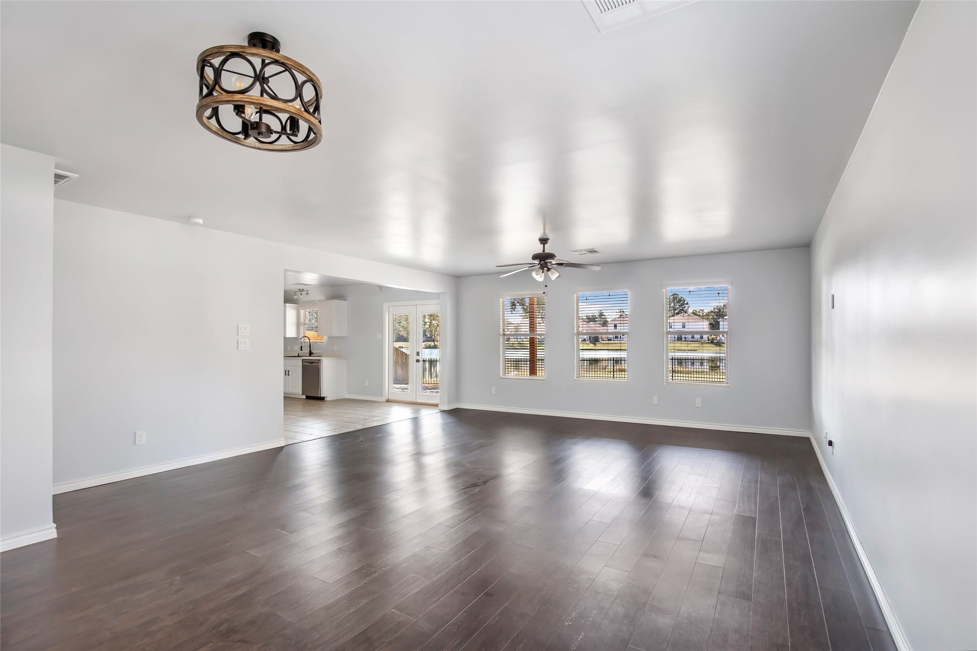 639 Trail Springs Court, Kingwood, TX 77339 Large living room with natural light and beautiful views of the backyard overlooking the pond