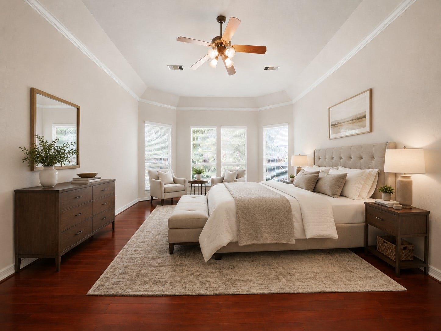 26306 Eden Point Court, Katy, TX 77494 Spacious primary bedroom with hardwood flooring, a tray ceiling, crown molding, ceiling fan, and a wall of windows providing natural light.