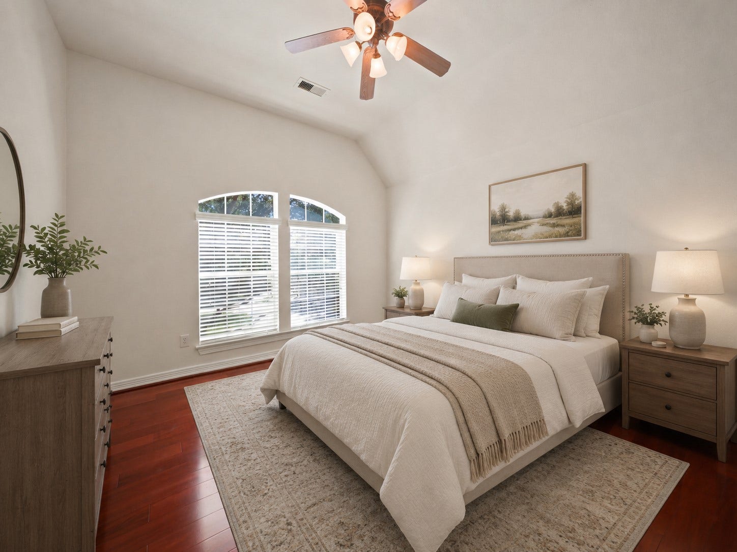 26306 Eden Point Court, Katy, TX 77494 Third secondary bedroom with hardwood flooring, a vaulted ceiling, ceiling fan, and arched windows providing natural light.