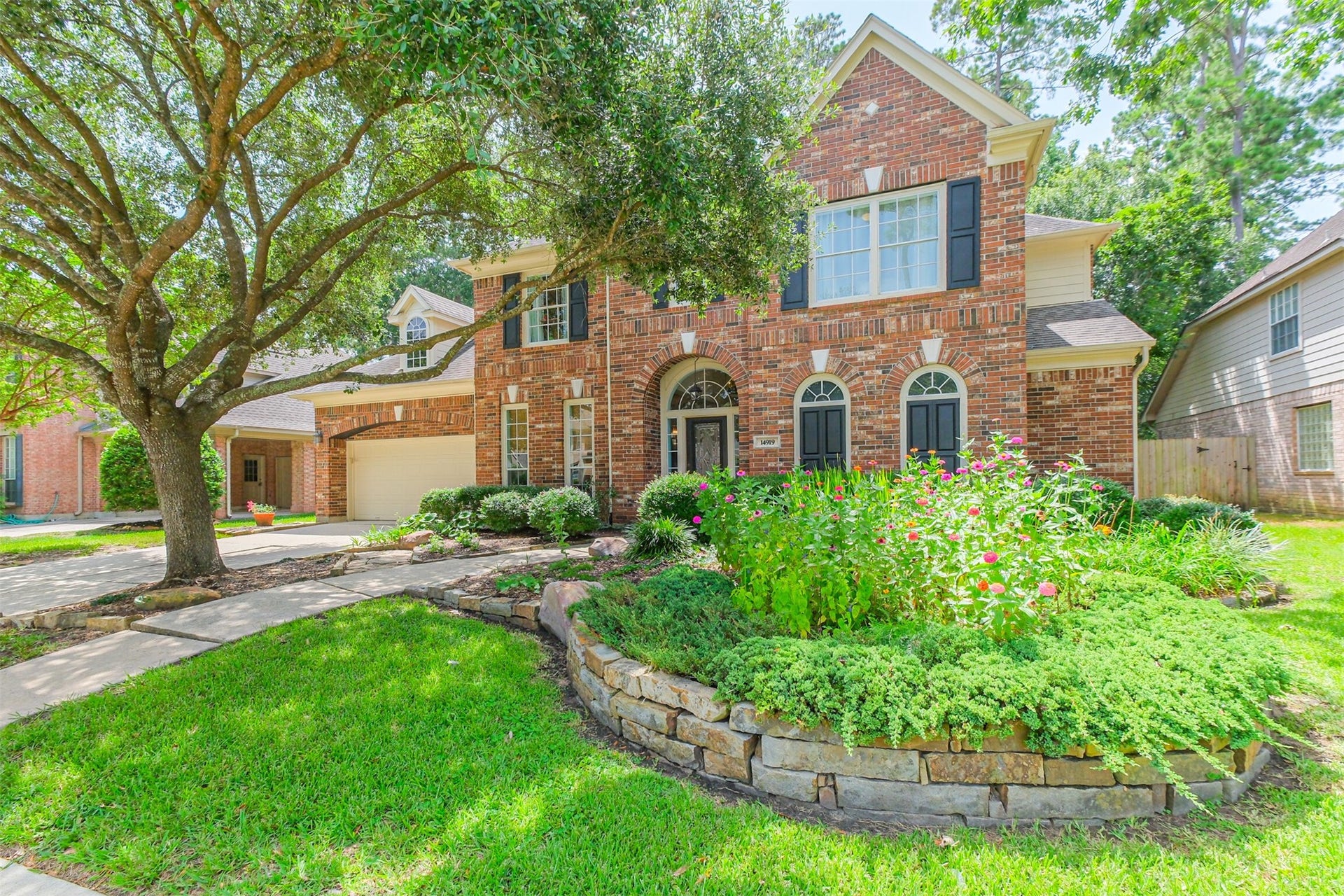 14919 Codys Run, Cypress, TX 77429 Exceptional curb appeal in one of Cypress' most desirable golf course communities. Mature trees, manicured landscaping, raised stone flower beds, and a classic brick exterior welcome you home, while the quiet cul-de-sac location adds both privacy and charm.