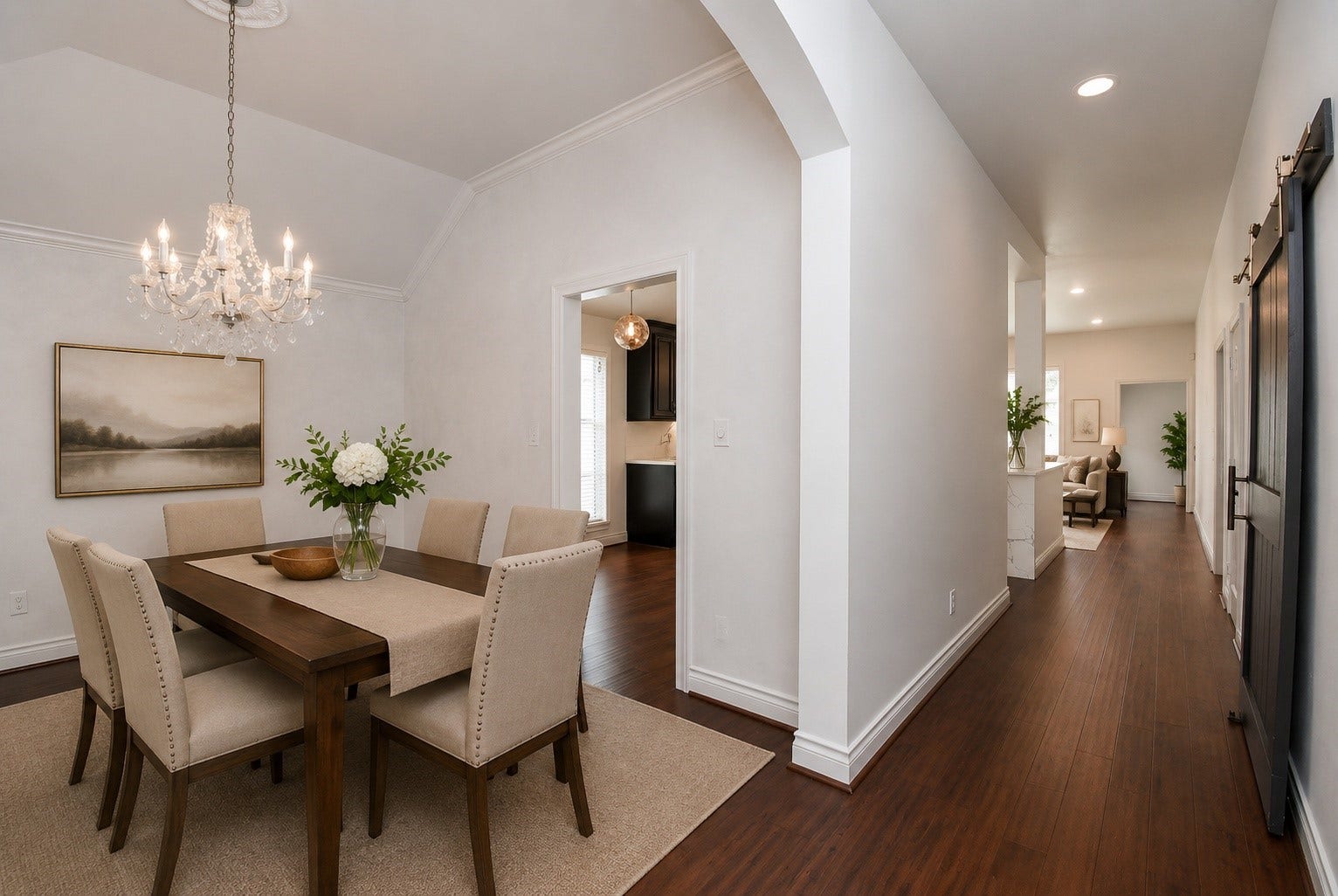 Enjoy a thoughtfully designed floor plan where the formal dining room flows effortlessly into the kitchen and living spaces. High ceilings, warm wood floors, and abundant natural light create an inviting setting for gatherings both large and small. Virtually staged!