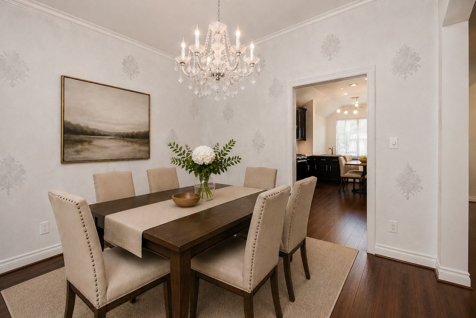 The formal dining room offers the perfect setting for entertaining while maintaining an effortless flow to the kitchen and breakfast area, creating a functional layout ideal for both everyday living and special occasions. Virtually staged