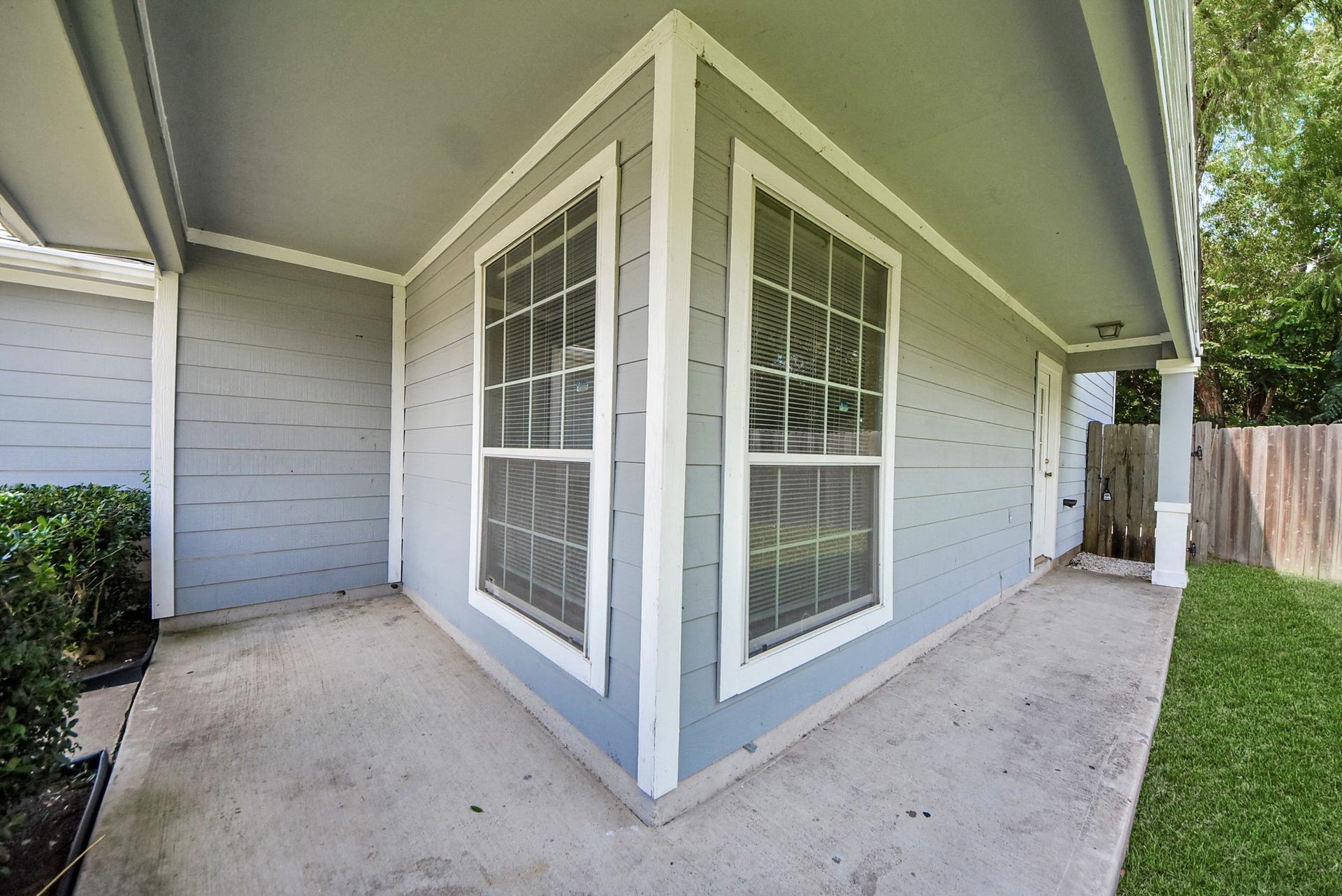 3006 Palace Oaks Drive, Houston, TX 77082 A covered walkway leads to the front door and can also serve as a small, shaded seating area.