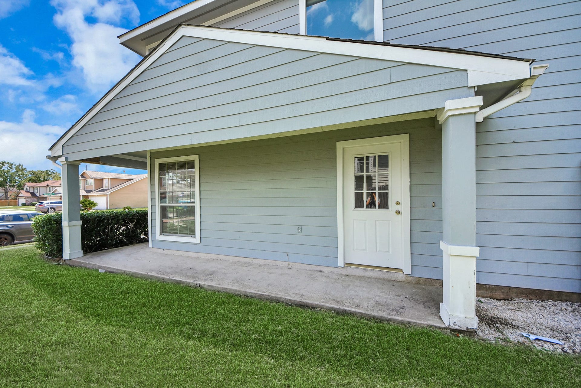 3006 Palace Oaks Drive, Houston, TX 77082 The front door is conveniently located on the side of the home, providing additional privacy.