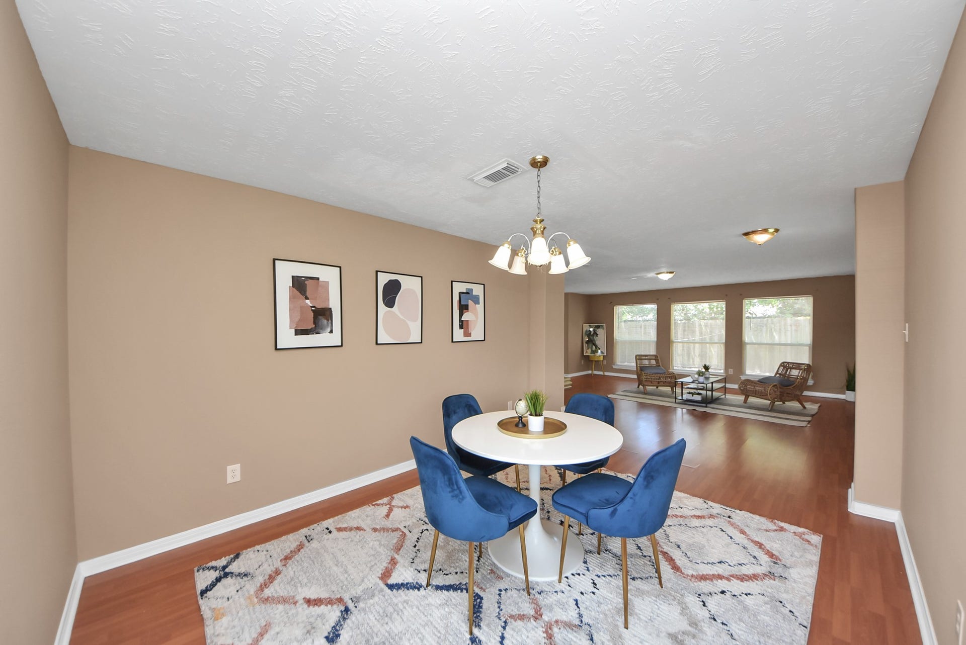 3006 Palace Oaks Drive, Houston, TX 77082 From this opposite angle, you can get a better view of the floor plan as you enter the home. The formal dining room is on the other side, while an additional wall of windows brings even more natural light into the living area.