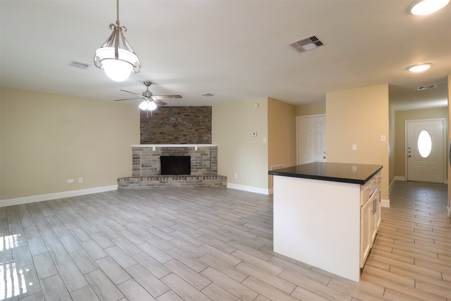 Dining/breakfast area, open to living room, kitchen on the right.