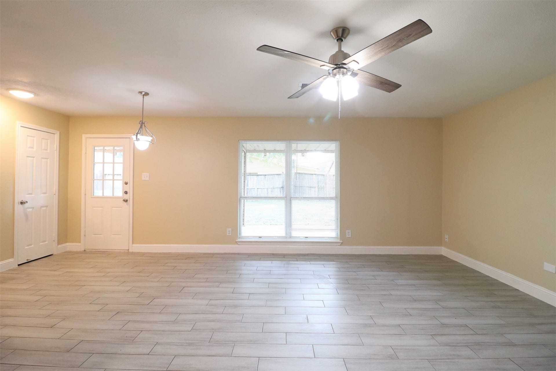 Living room overlooking the backyard and breakfast area.