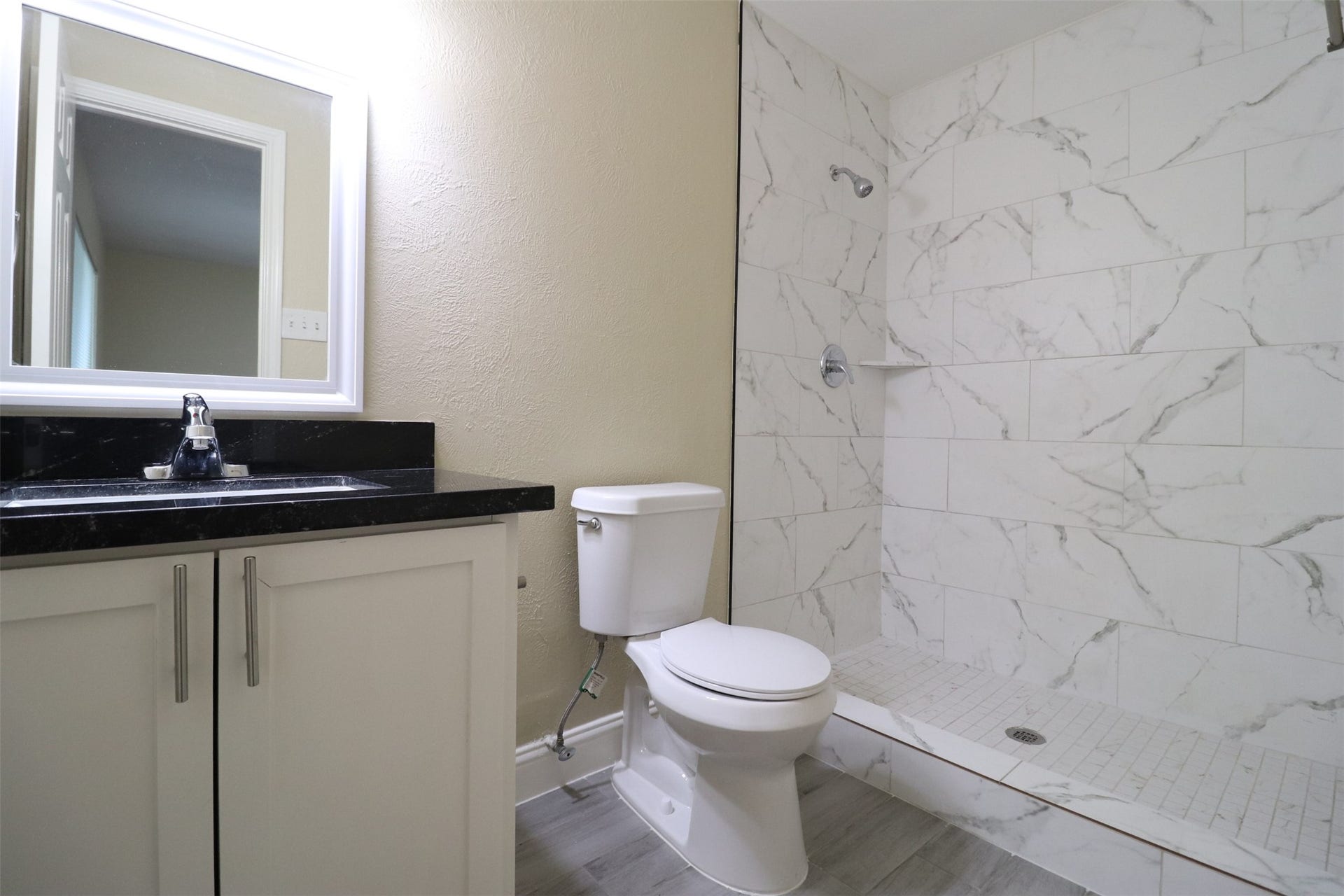 Primary bathroom with shower.