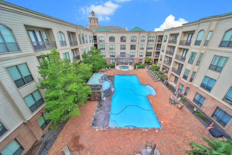 2299 Lone Star Drive, #406, Sugar Land, TX 77479 While sipping your daily morning coffee from the living room, ENJOY Peaceful views overlooking courtyard and sparking oasis-style pool.