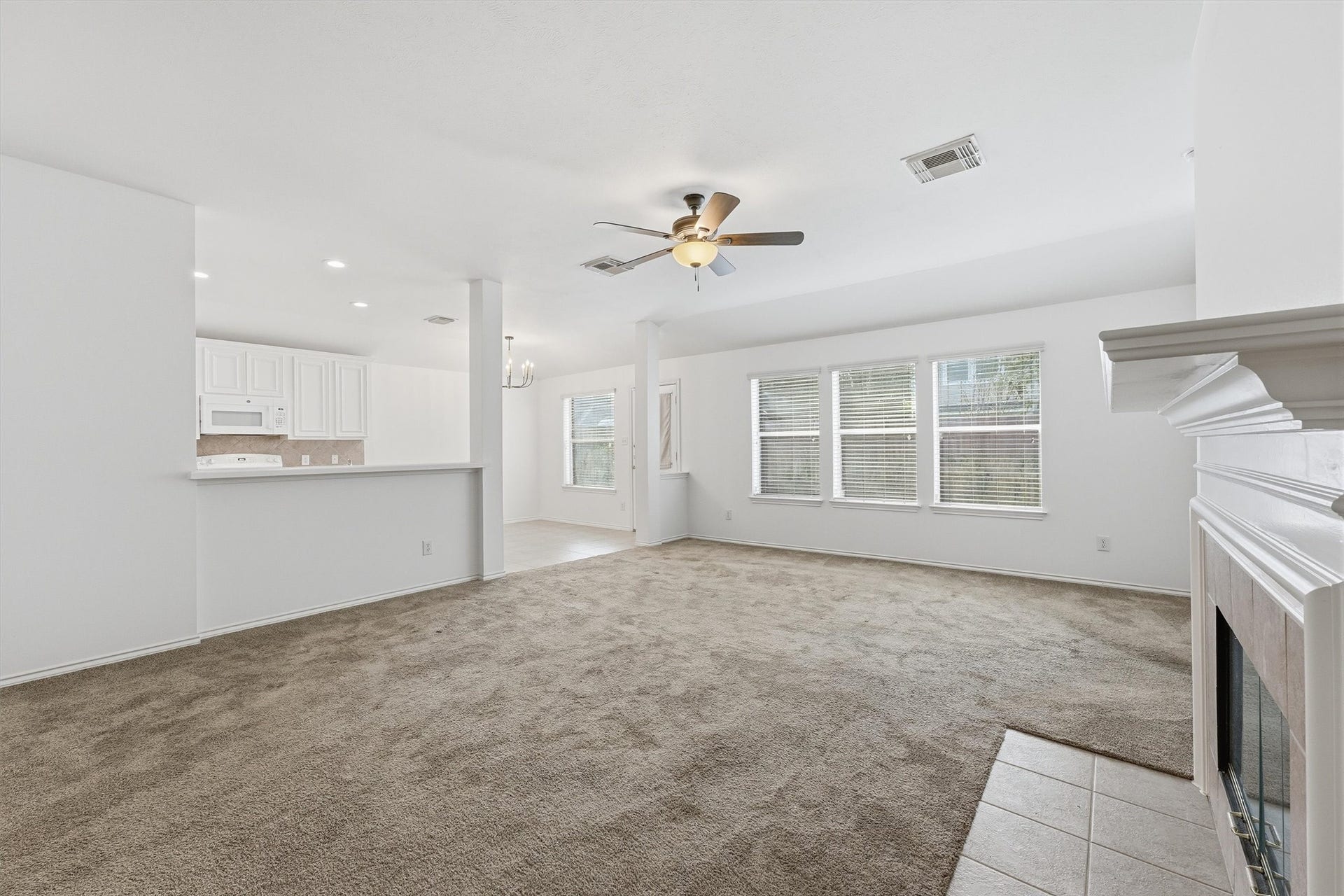 2227 Ridgefield Park Lane, Richmond, TX 77469 Living Room open to the Kitchen