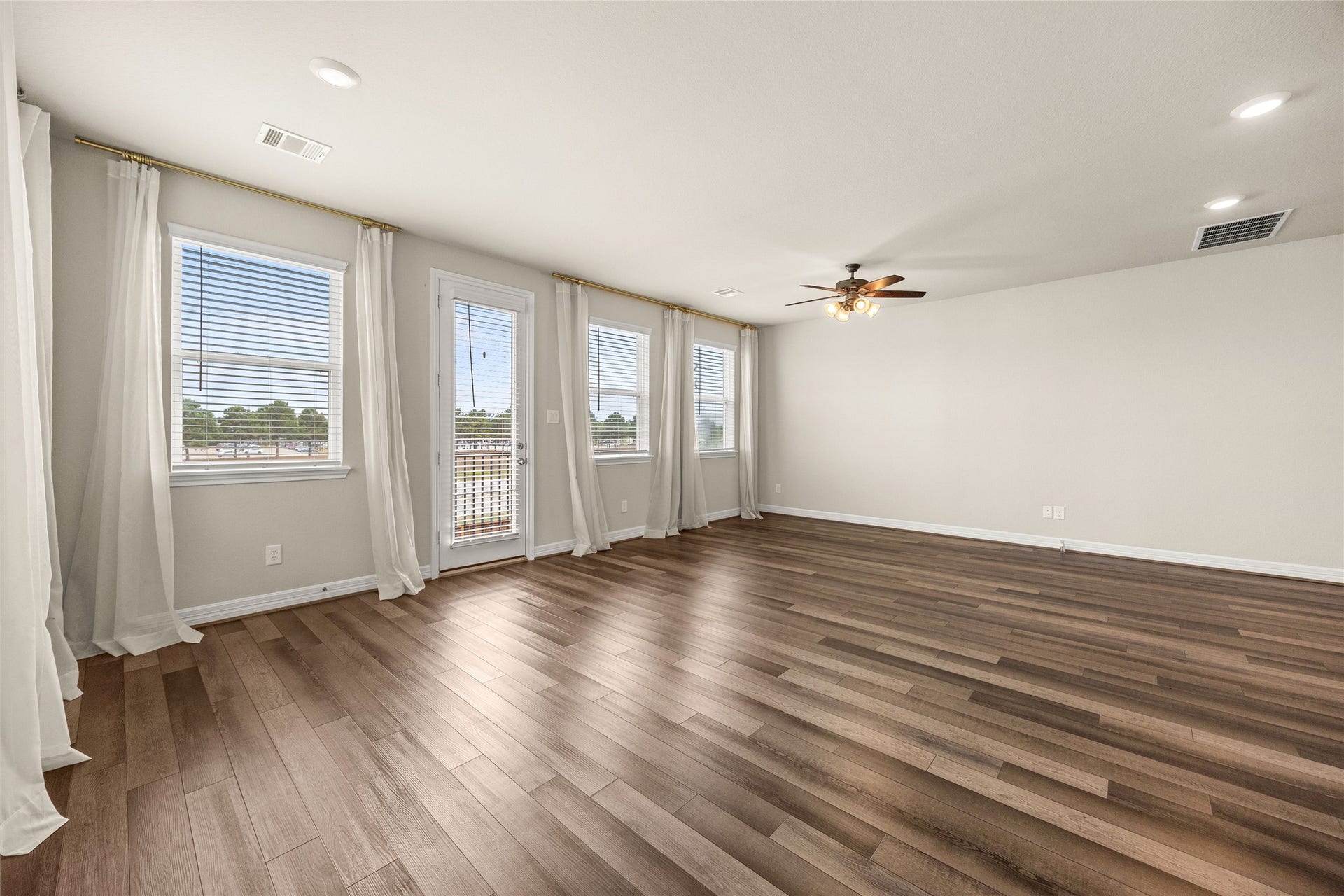 18223 Crystal Knoll Drive, Cypress, TX 77433 Natural light brightens the room while neutral finishes make this an easy space to furnish in just about any style.