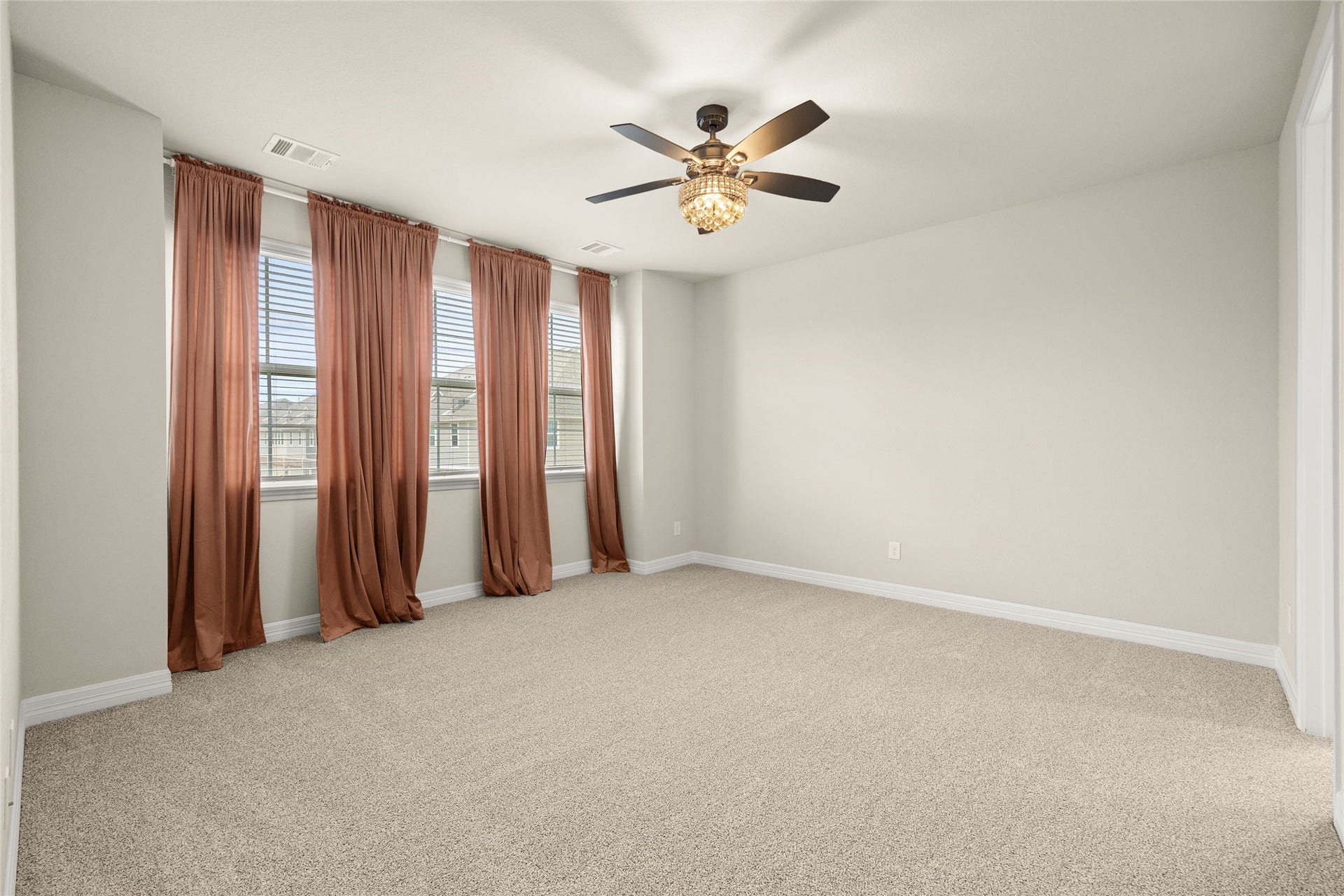 18223 Crystal Knoll Drive, Cypress, TX 77433 Retreat upstairs to a spacious primary bedroom with plenty of room to create more than just a place to sleep.