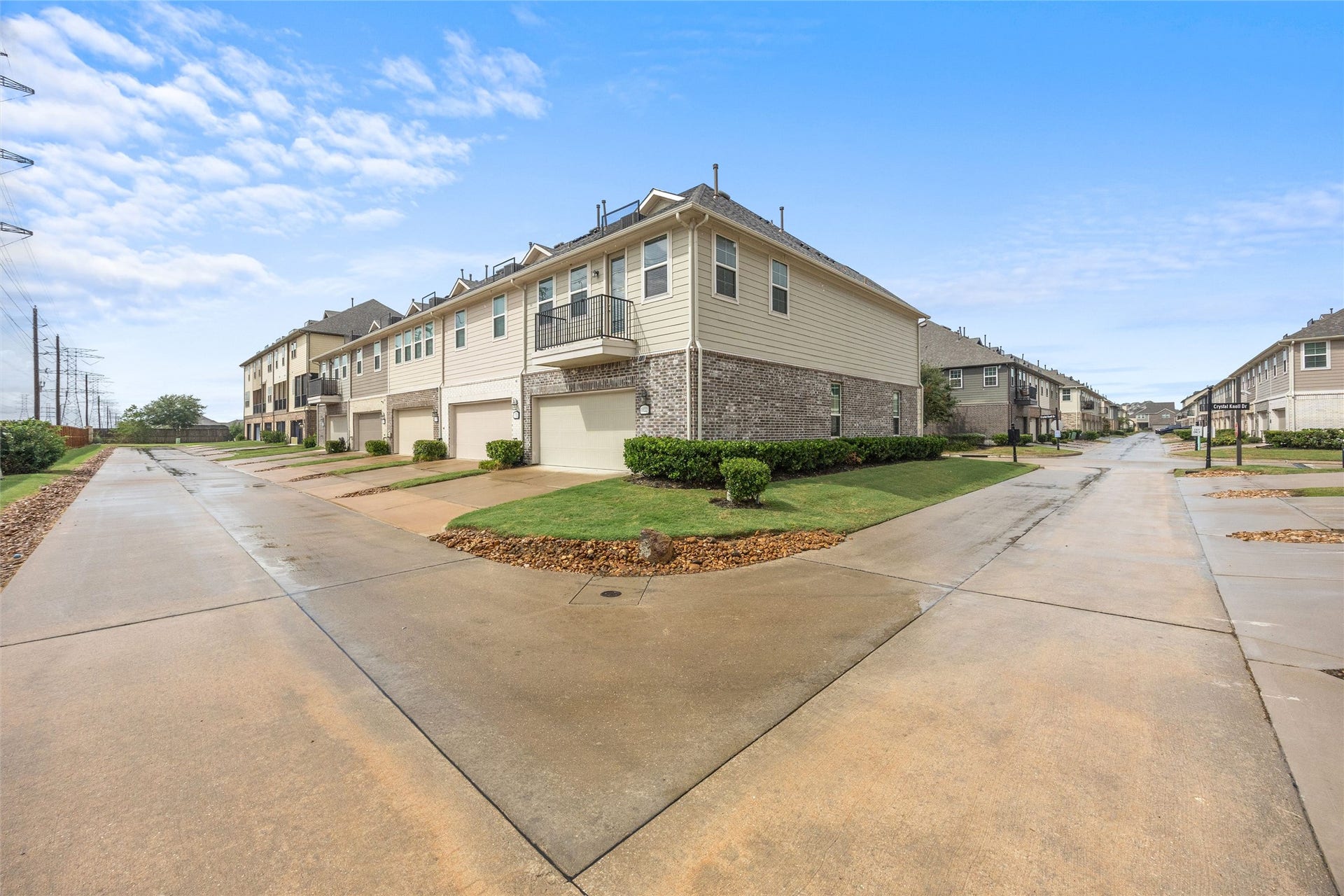 18223 Crystal Knoll Drive, Cypress, TX 77433 Being positioned at the end of the building gives this home additional exterior exposure and windows along the side.