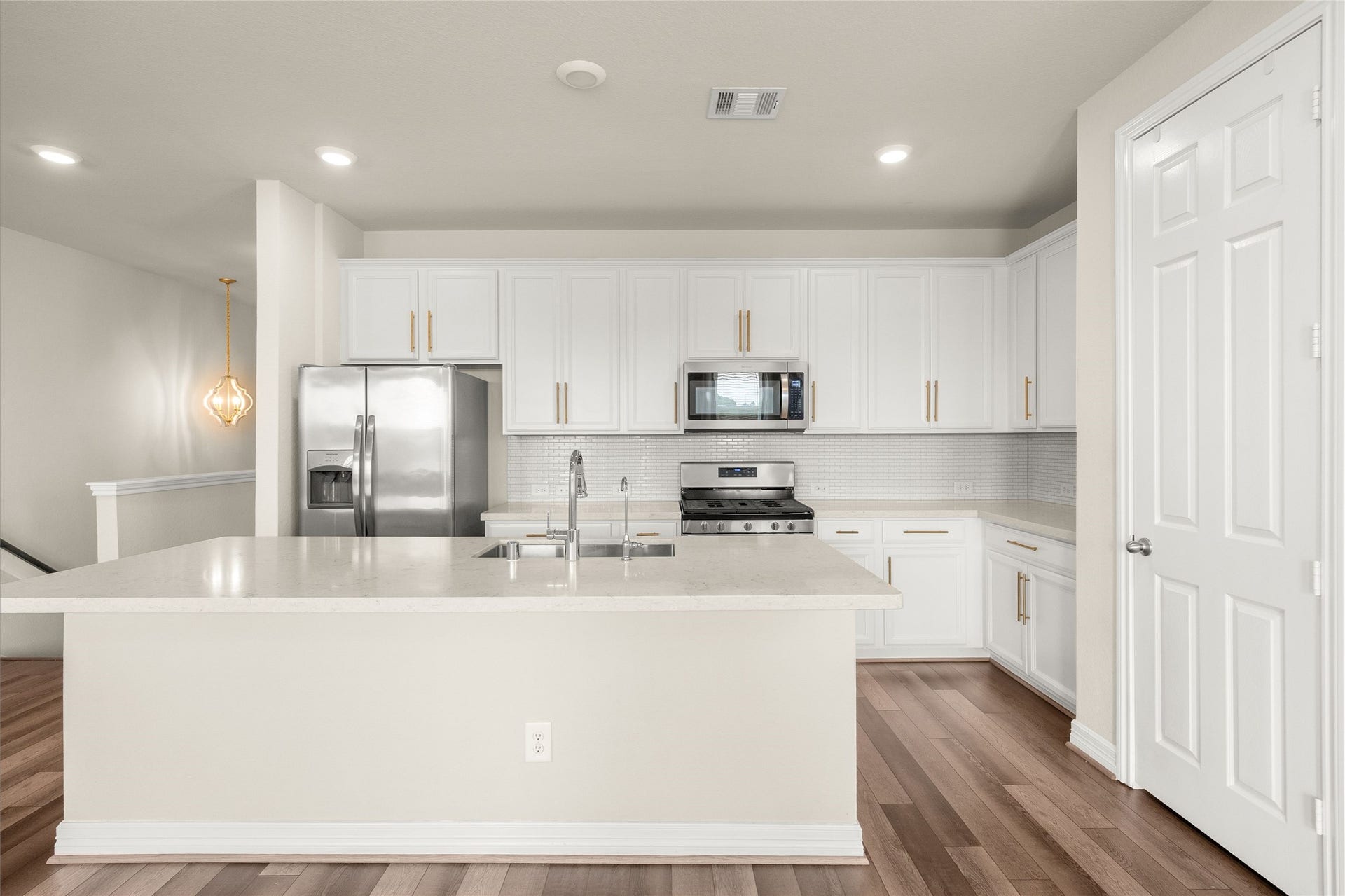 18223 Crystal Knoll Drive, Cypress, TX 77433 The kitchen brings together function and style with generous cabinetry, ample prep space, and an easy connection to the main living area.