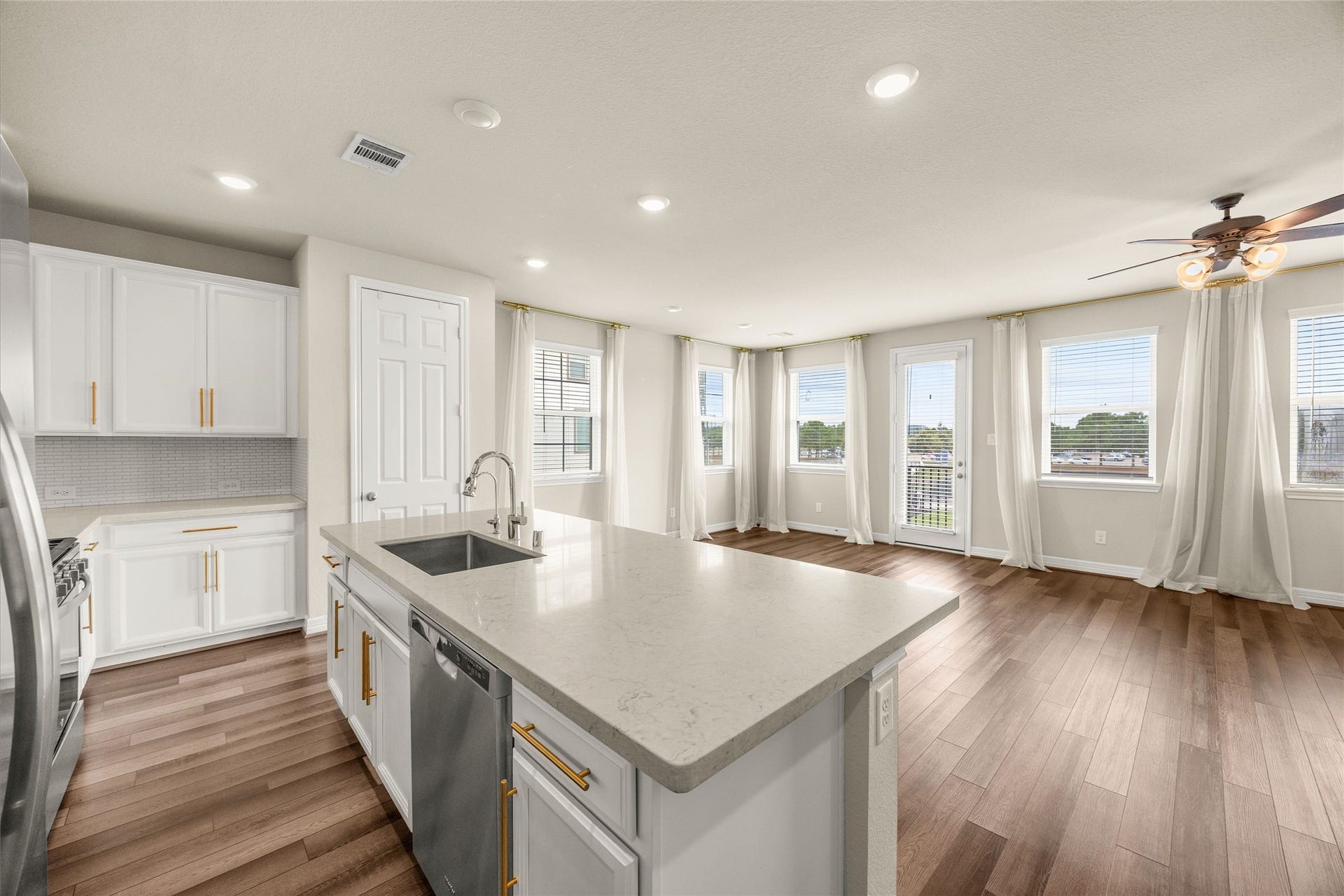 18223 Crystal Knoll Drive, Cypress, TX 77433 A practical layout gives the cook room to work while still staying connected to everyone in the adjoining spaces.