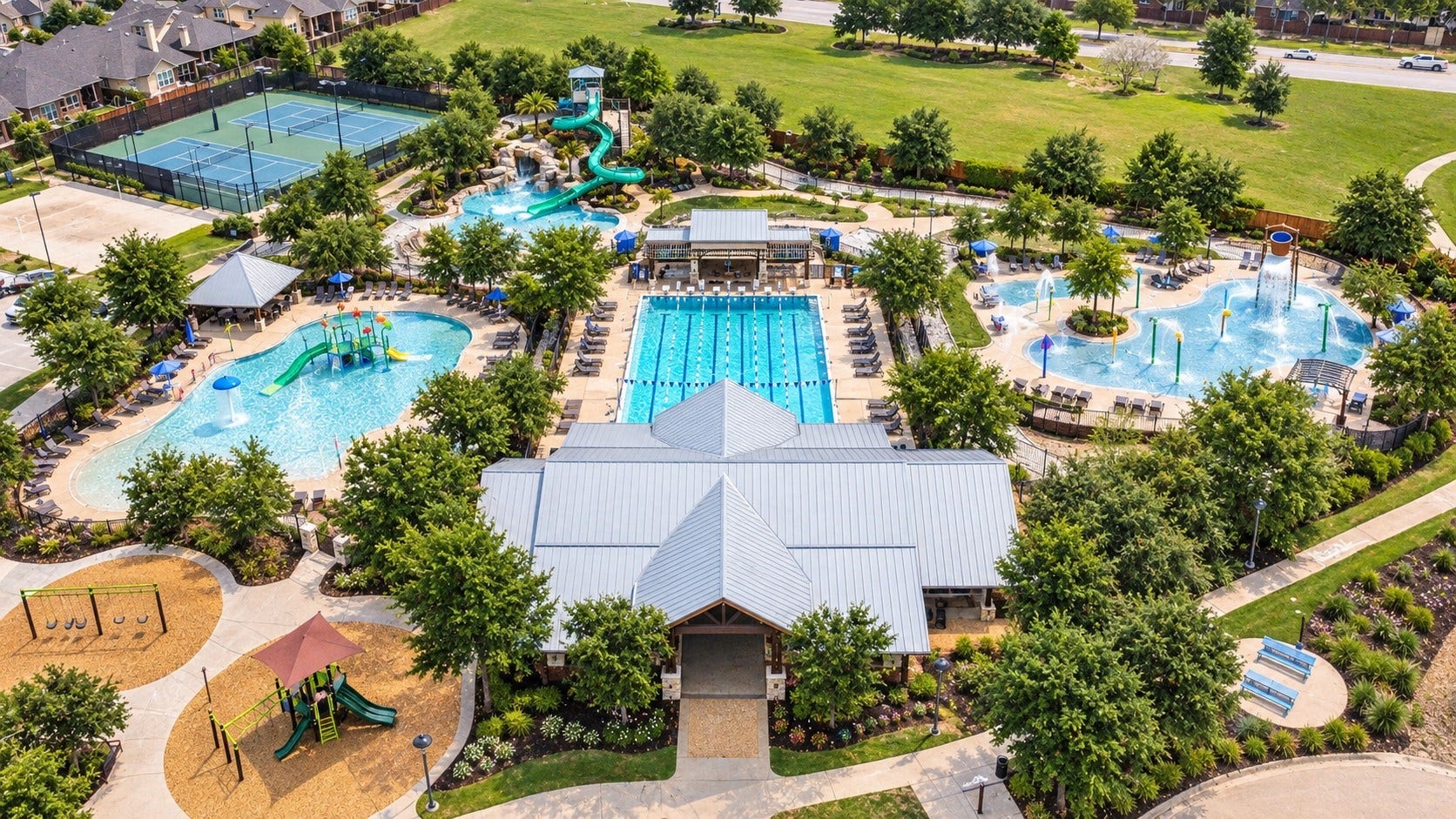 18223 Crystal Knoll Drive, Cypress, TX 77433 Towne Lake's Lakehouse has a waterpark, multiple pools, a splash pad and lazy river.