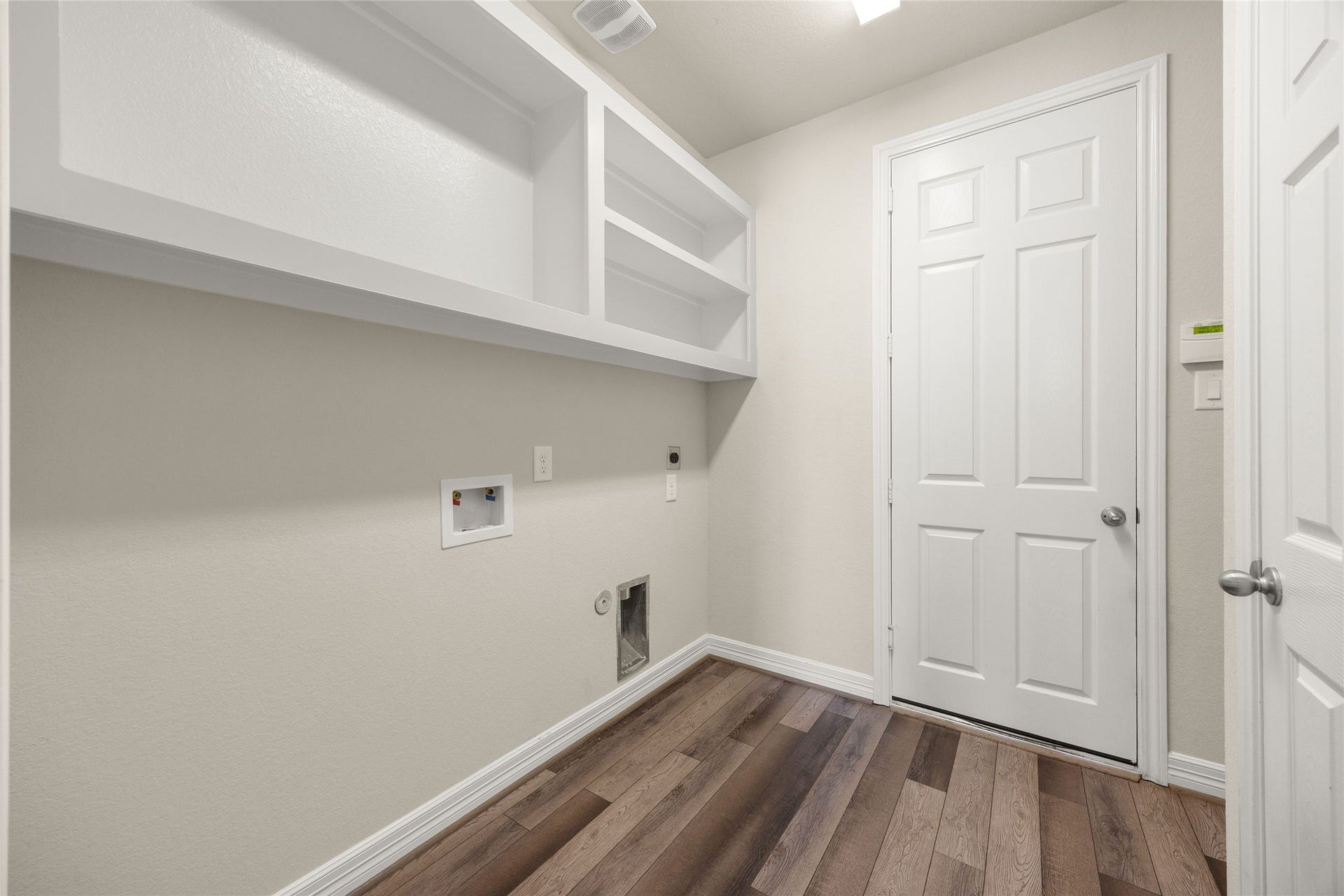 18223 Crystal Knoll Drive, Cypress, TX 77433 A dedicated laundry room keeps everyday chores tucked away and organized without taking up space elsewhere in the home.