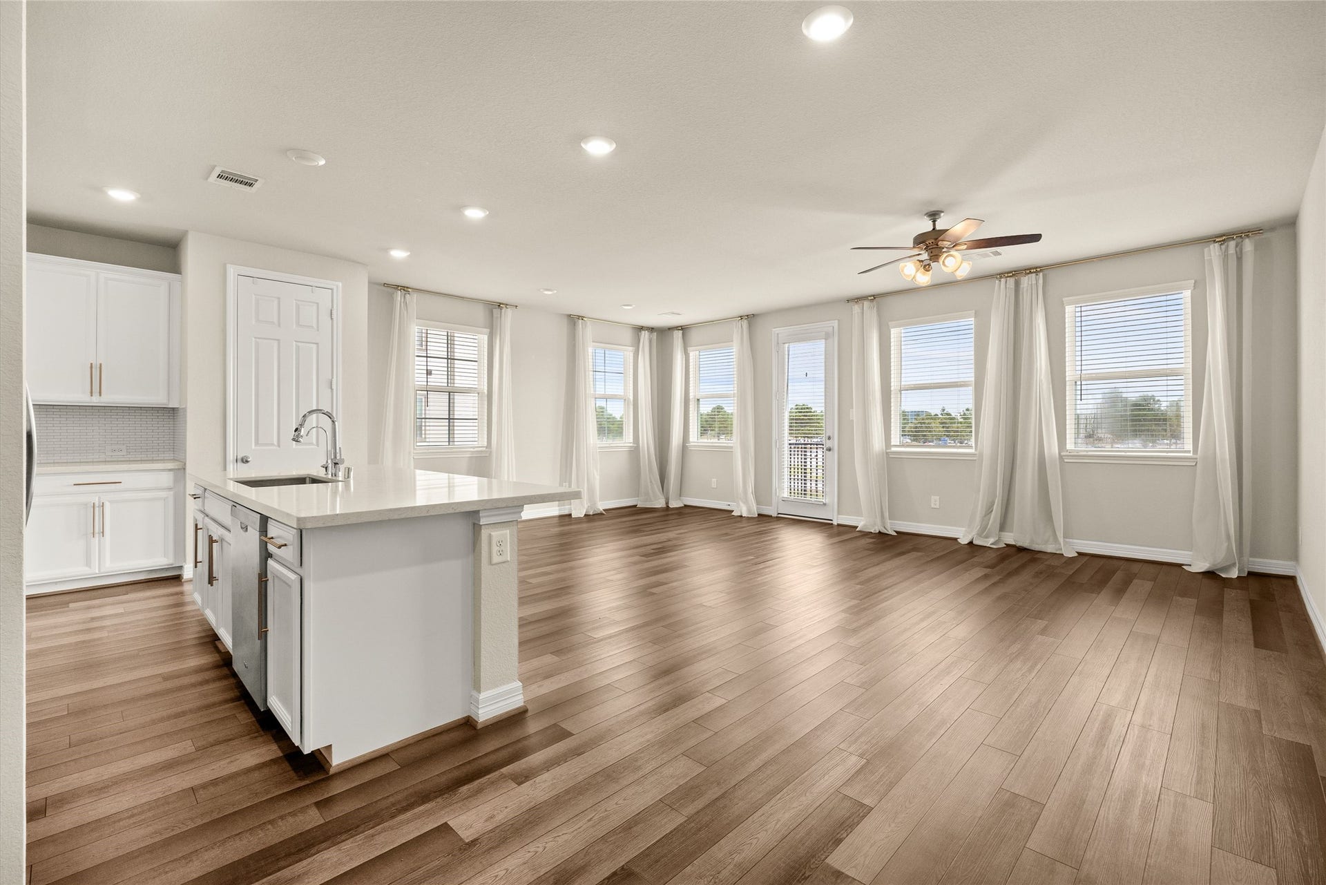 18223 Crystal Knoll Drive, Cypress, TX 77433 Whether you're hosting friends or settling in for movie night, there's plenty of room to create a comfortable gathering space.