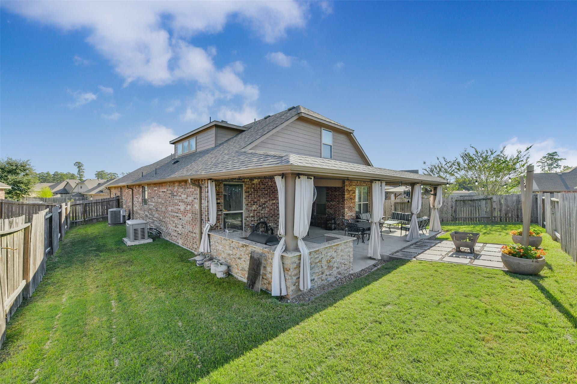 18015 Svensson Slade Lane, Houston, TX 77044 A whole house generator, large built in outdoor kitchen and a patio you will never wanna leave