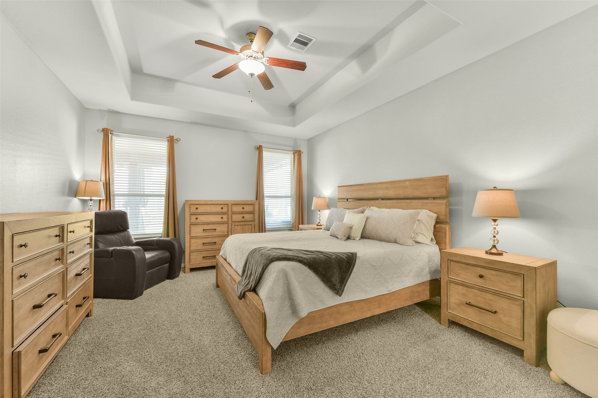 18015 Svensson Slade Lane, Houston, TX 77044 Large master bedroom with neutral fresh paint coffered ceilings and views overlooking large covered patio