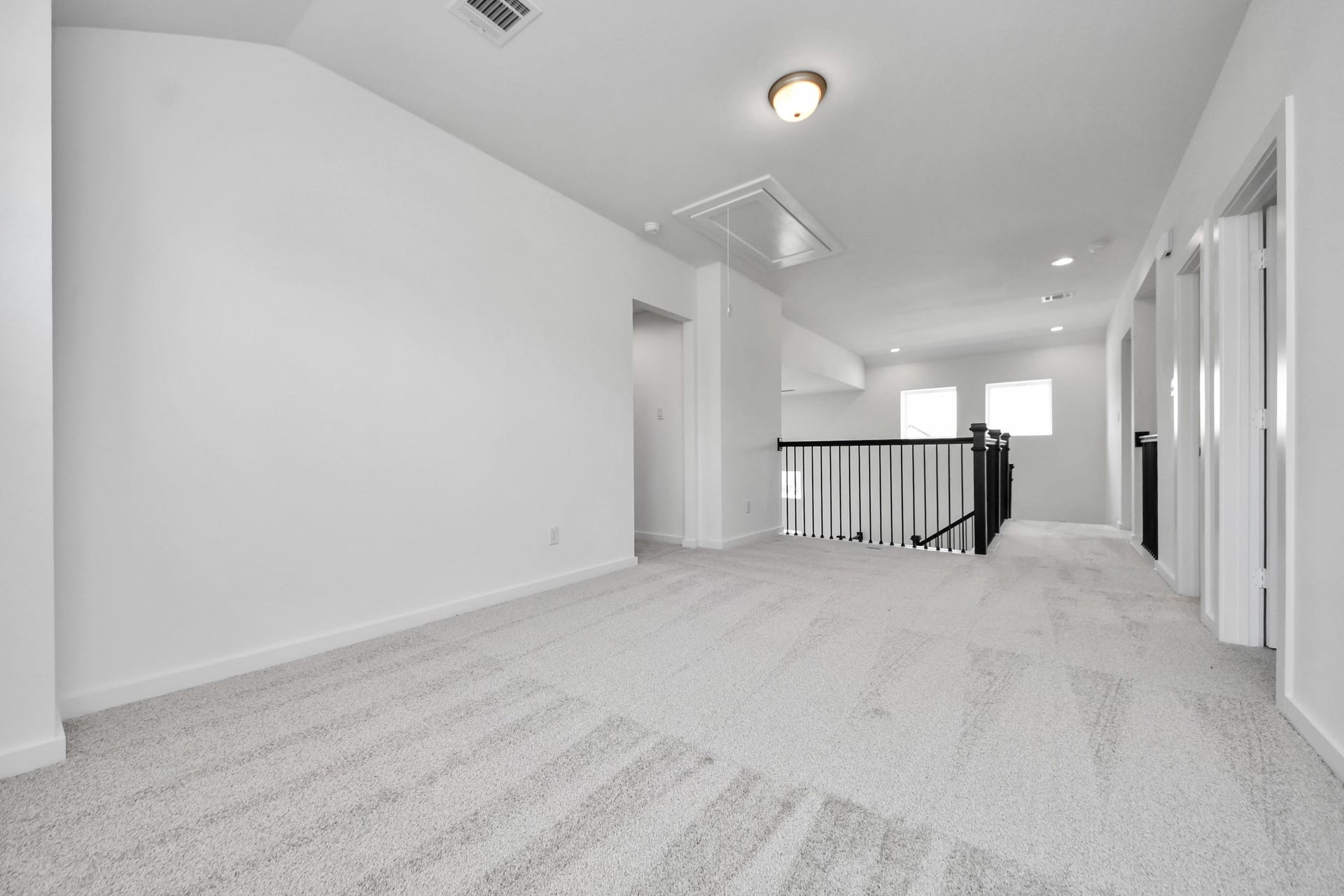 3064 Spoolwood Trail, Magnolia, TX 77355 Come upstairs and enjoy a day of leisure in this fabulous game room! This is the perfect hangout spot or adult game room! Features plush carpet, high ceilings, custom paint and windows for plenty of natural light.