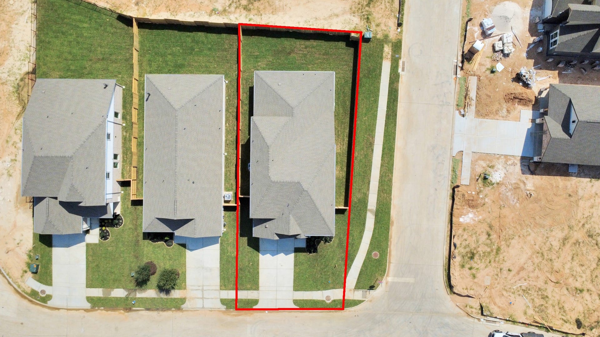 3064 Spoolwood Trail, Magnolia, TX 77355 An aerial view of a spacious subdivision lot, highlighting a well-maintained yard and a fully fenced perimeter, offering both privacy and expansive outdoor space.