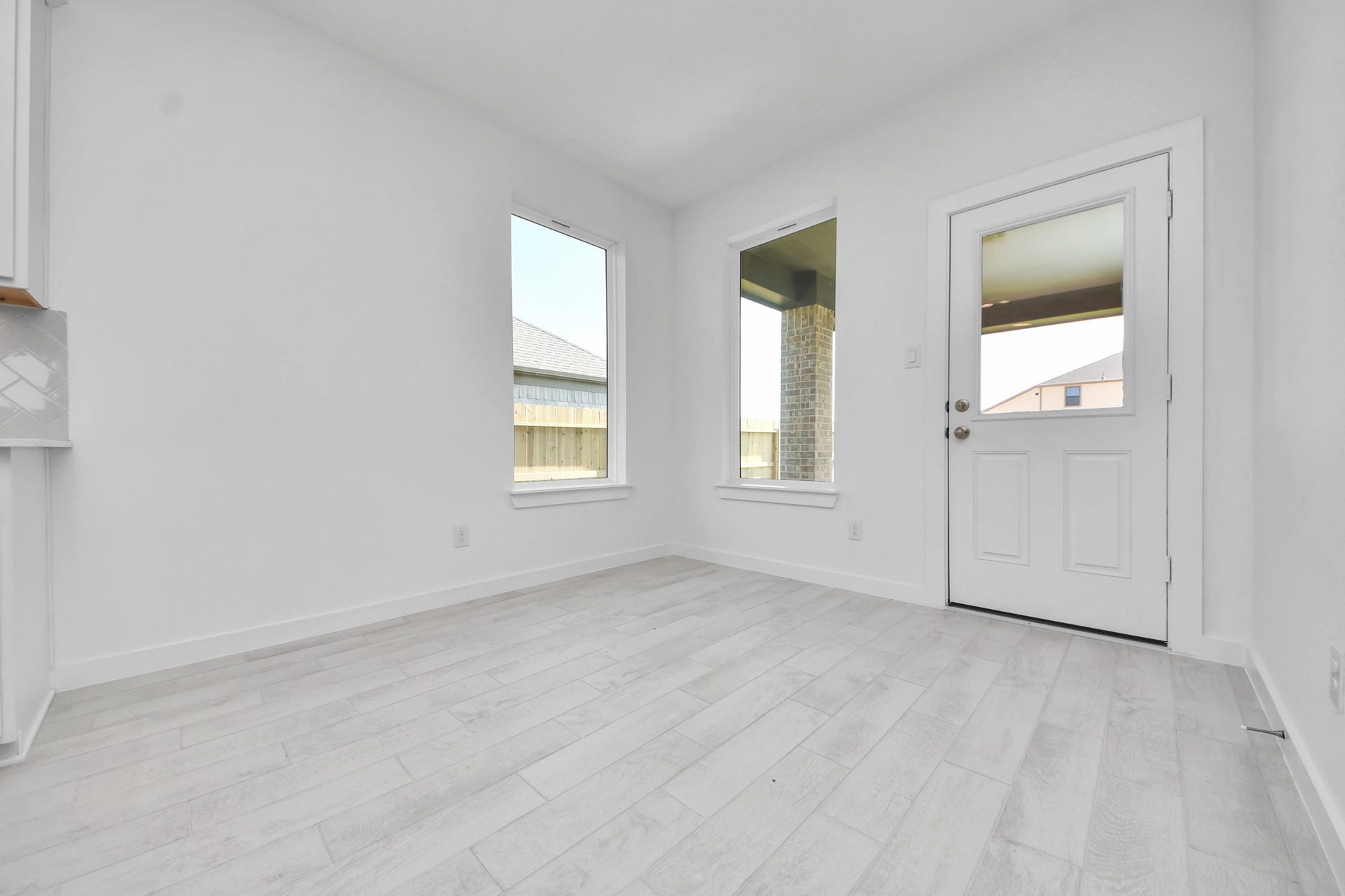 3064 Spoolwood Trail, Magnolia, TX 77355 Enjoy breakfast with ease in the connected and cozy breakfast area, seamlessly integrated with the kitchen for utmost convenience. Step through the back door for a breath of fresh air onto the covered patio, extending your living space to the outdoors