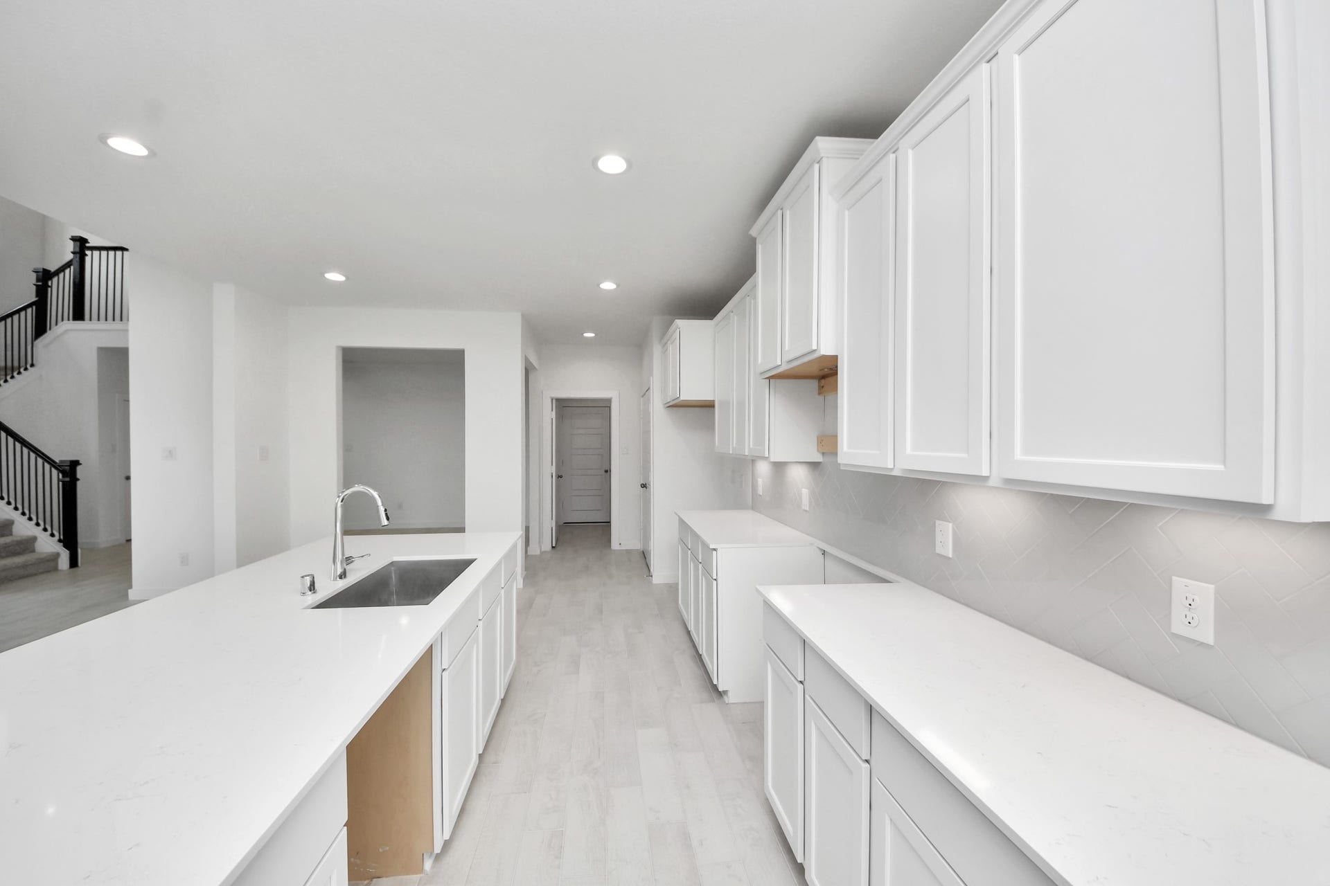 3064 Spoolwood Trail, Magnolia, TX 77355 All of this overlooks your expansive family room, creating a perfect space for culinary delights and family gatherings.