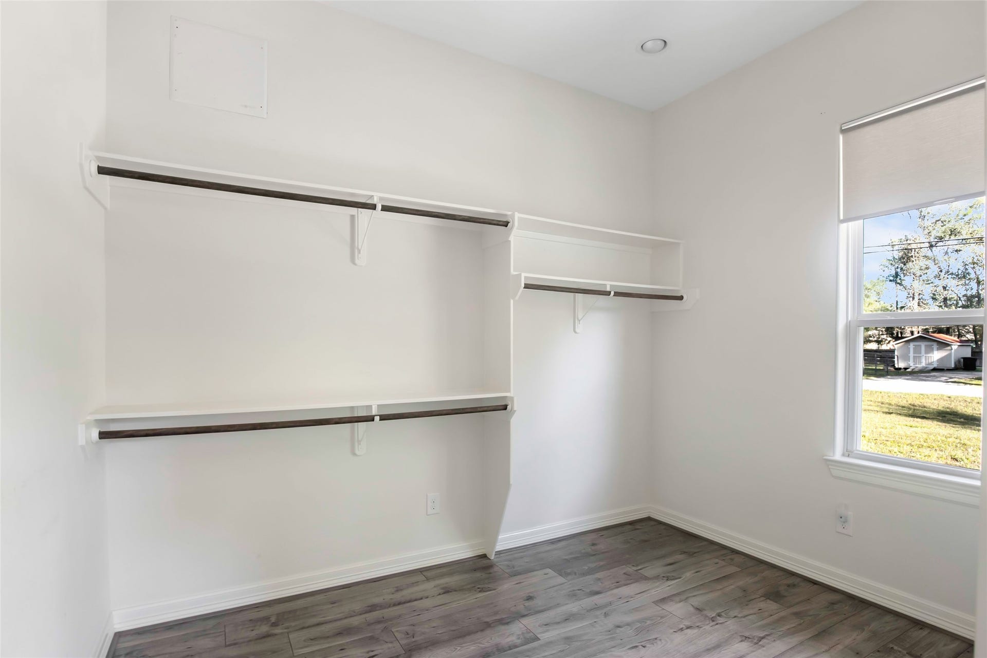 538 Magnolia Point Drive, Huffman, TX 77336 Master closet with new flooring and recessed lighting