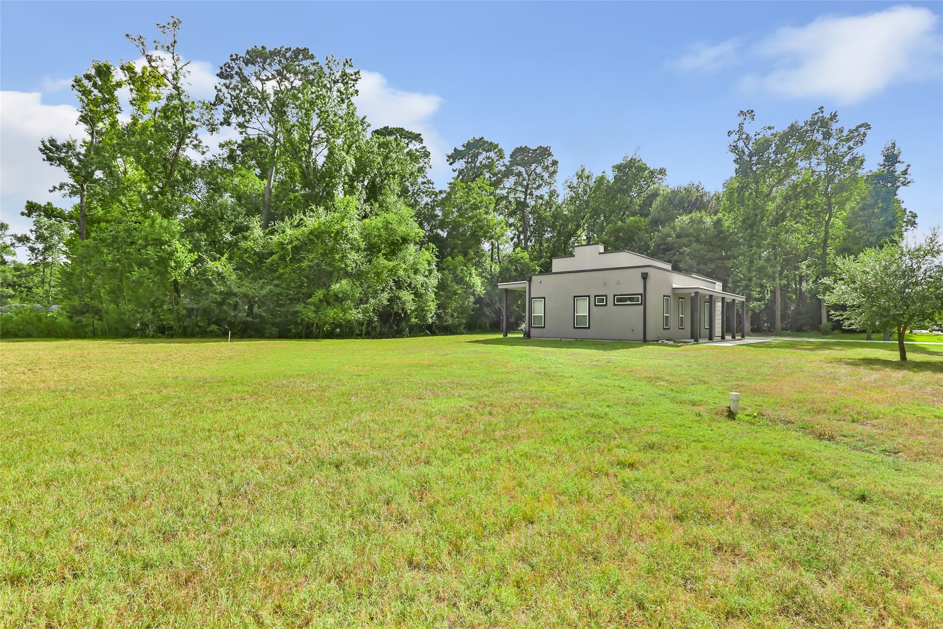 538 Magnolia Point Drive, Huffman, TX 77336 View from front corner of property