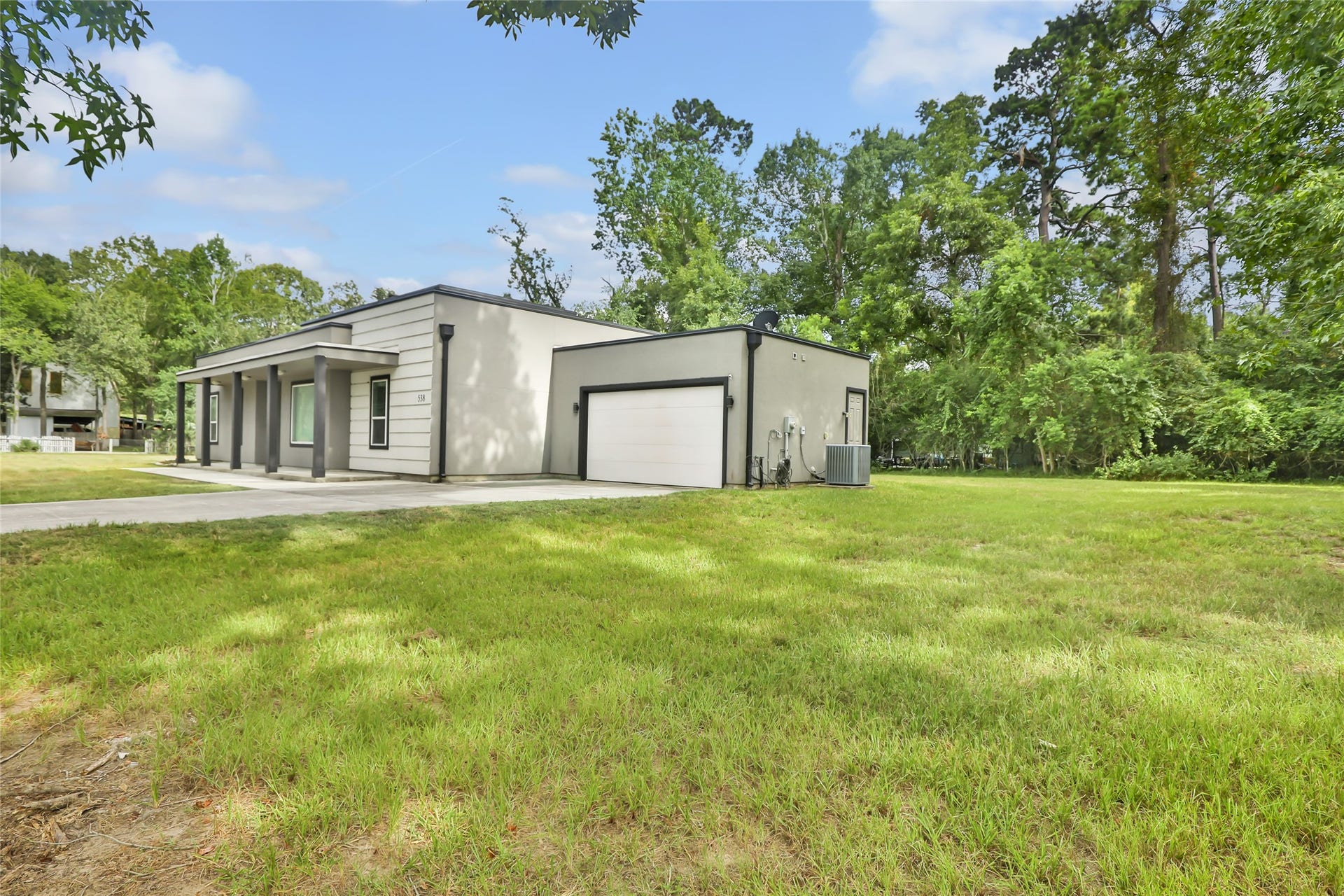 538 Magnolia Point Drive, Huffman, TX 77336 Front right of home