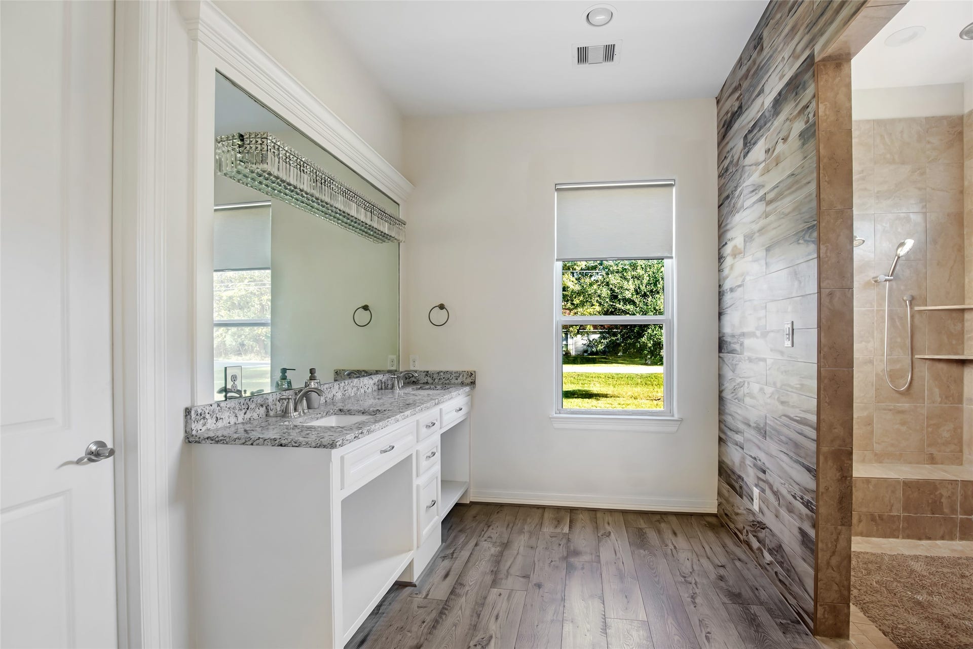 538 Magnolia Point Drive, Huffman, TX 77336 Master bathroom with double sinks and large, walk-in shower and closet