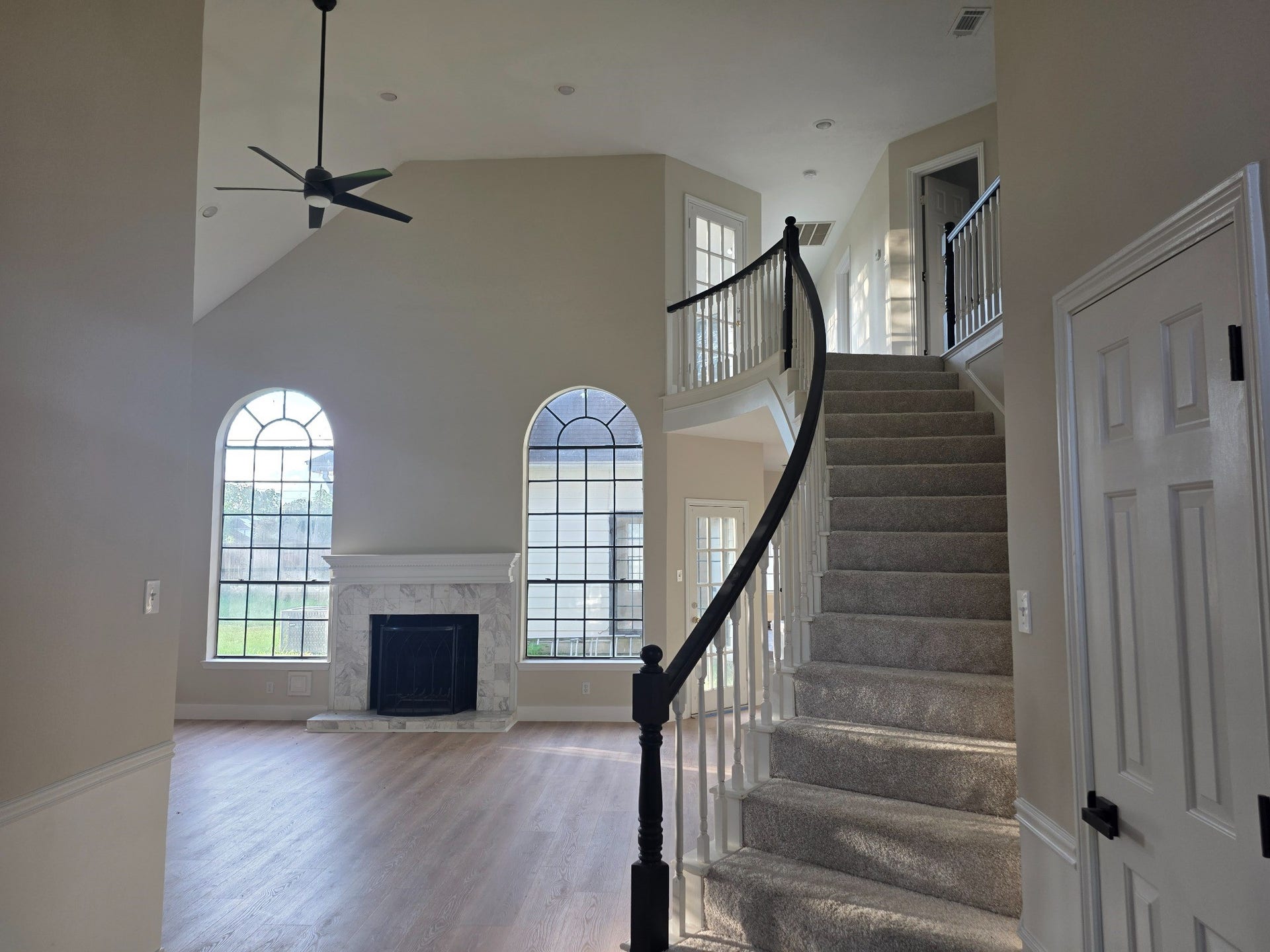 414 Mill Place CT, Sugar Land, TX 77498 Beautiful fireplace, abundant natural light, enhances this spacious living room