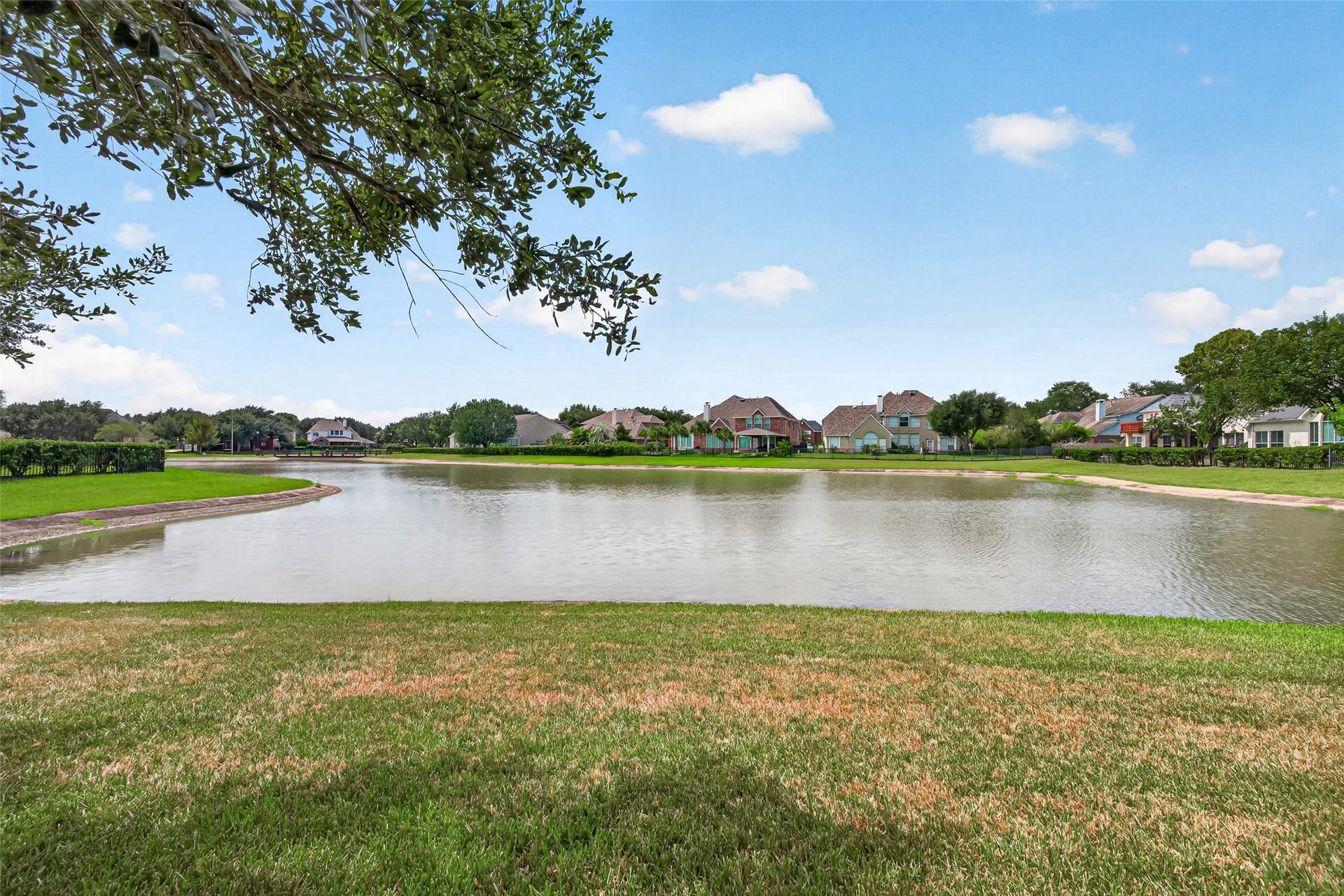 1711 Emma Cove Court, Sugar Land, TX 77479 Scenic community lake is located in the cul-de-sac just outside the home, perfect for evening strolls and enjoying the peaceful surroundings.