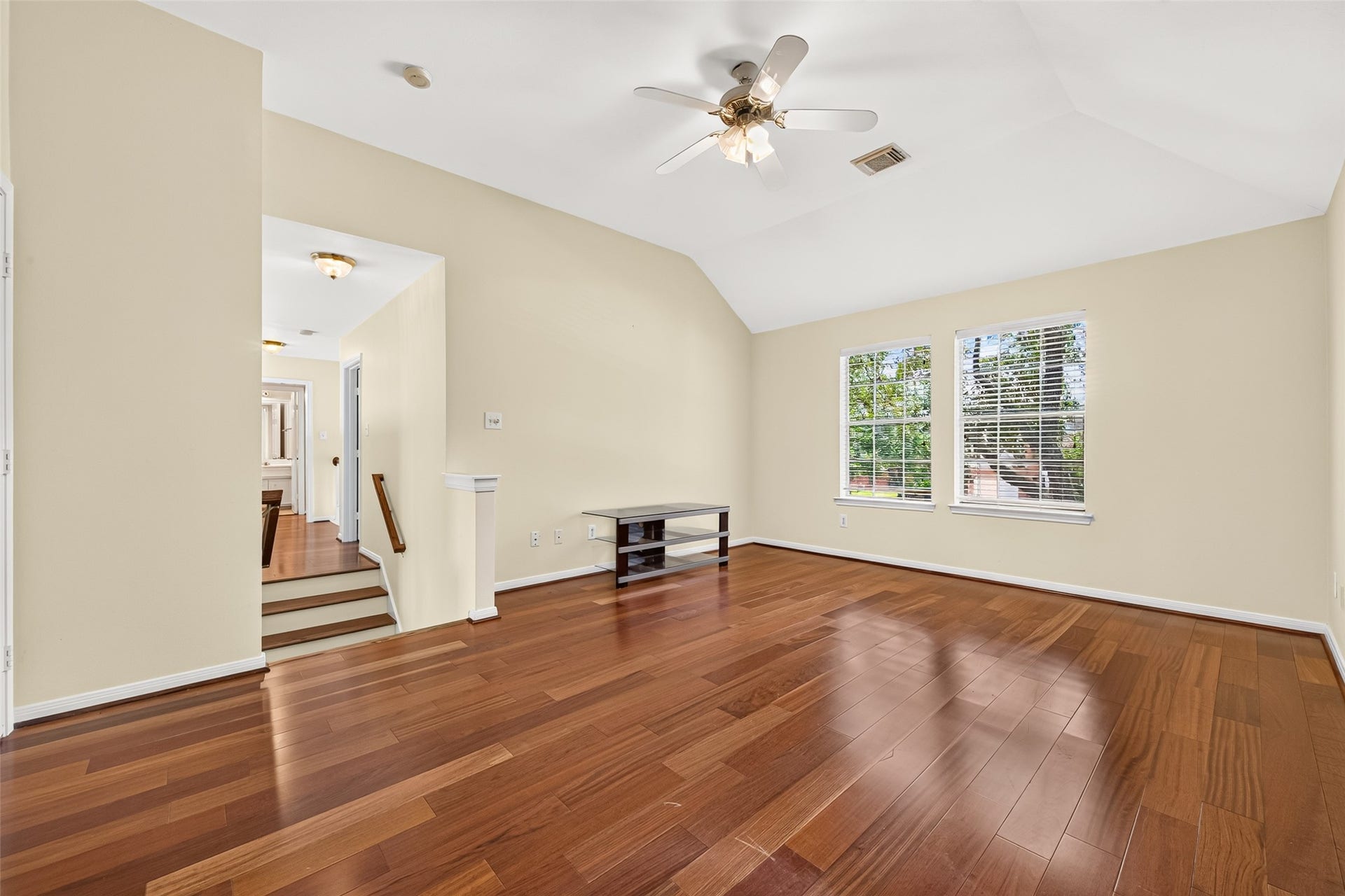 1711 Emma Cove Court, Sugar Land, TX 77479 Natural light and an open layout make this flexible loft ideal for recreation, media, or relaxation.