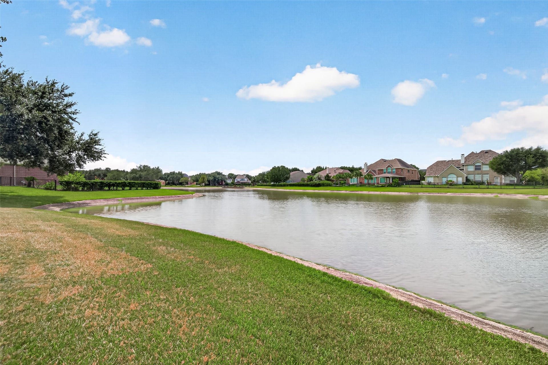 1711 Emma Cove Court, Sugar Land, TX 77479 ust steps from the home, the cul-de-sac lake offers a relaxing setting to unwind, connect with nature, and take in the neighborhood scenery.