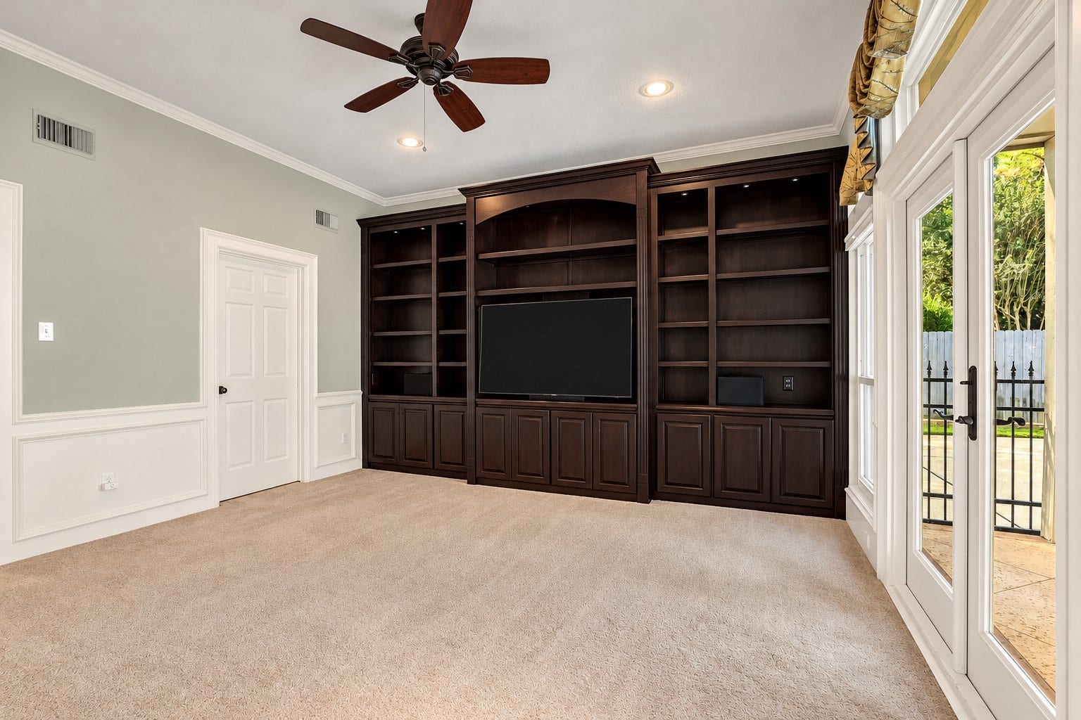 5907 Rocky Brook Drive, Houston, TX 77345 Separate den with entertainment center and access to the pool area.