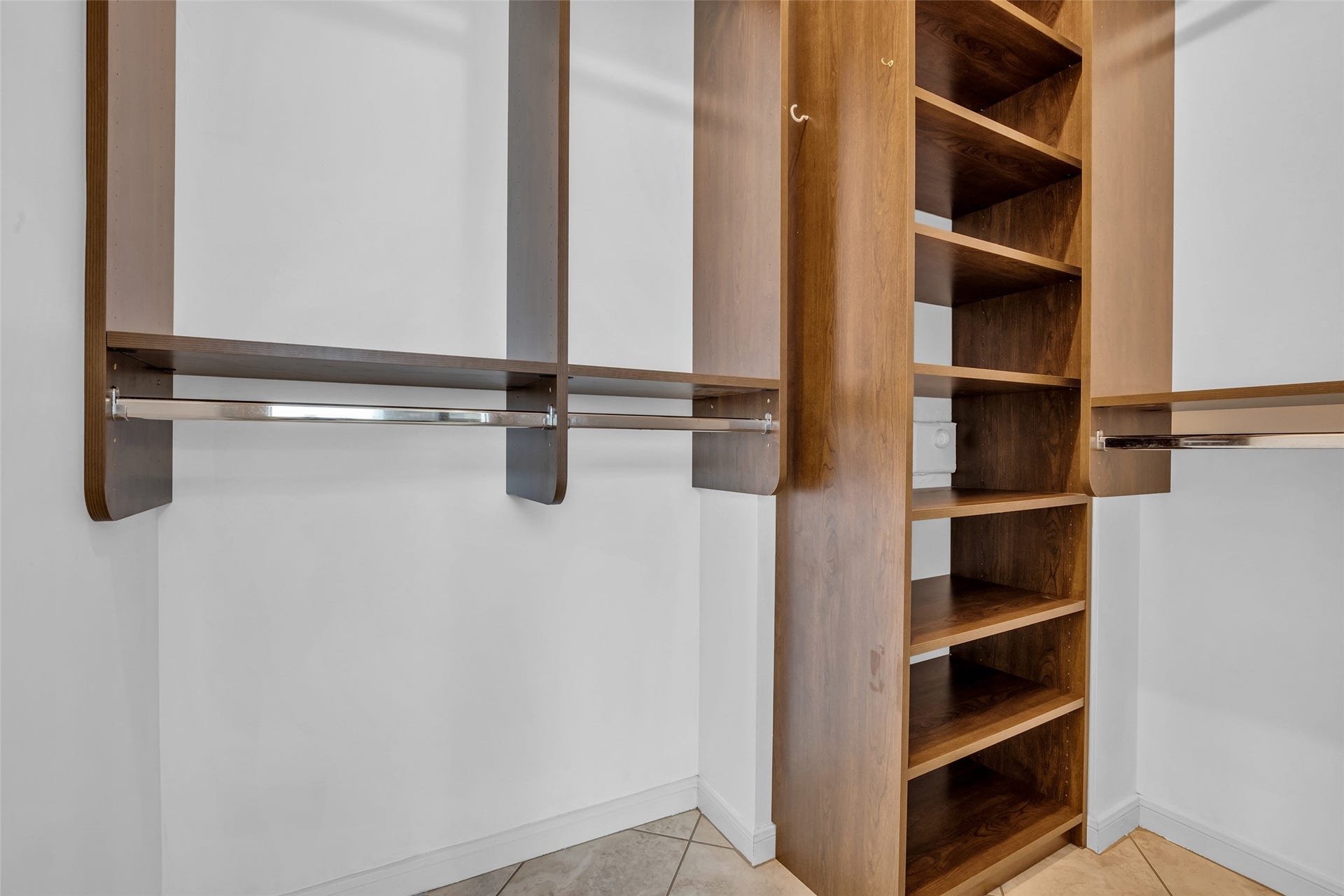 5907 Rocky Brook Drive, Houston, TX 77345 One walk-in-closet with closet system.