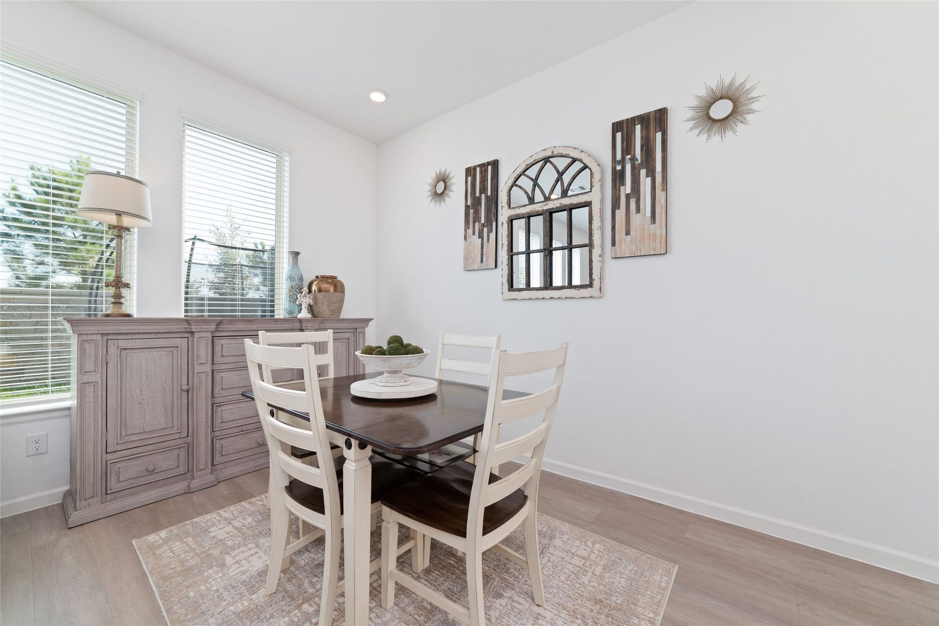 5715 Foggy Vine Court, Fulshear, TX 77441 The dining area offers ample room for a dining table, with beautiful natural light and convenient access to the kitchen for effortless entertaining.